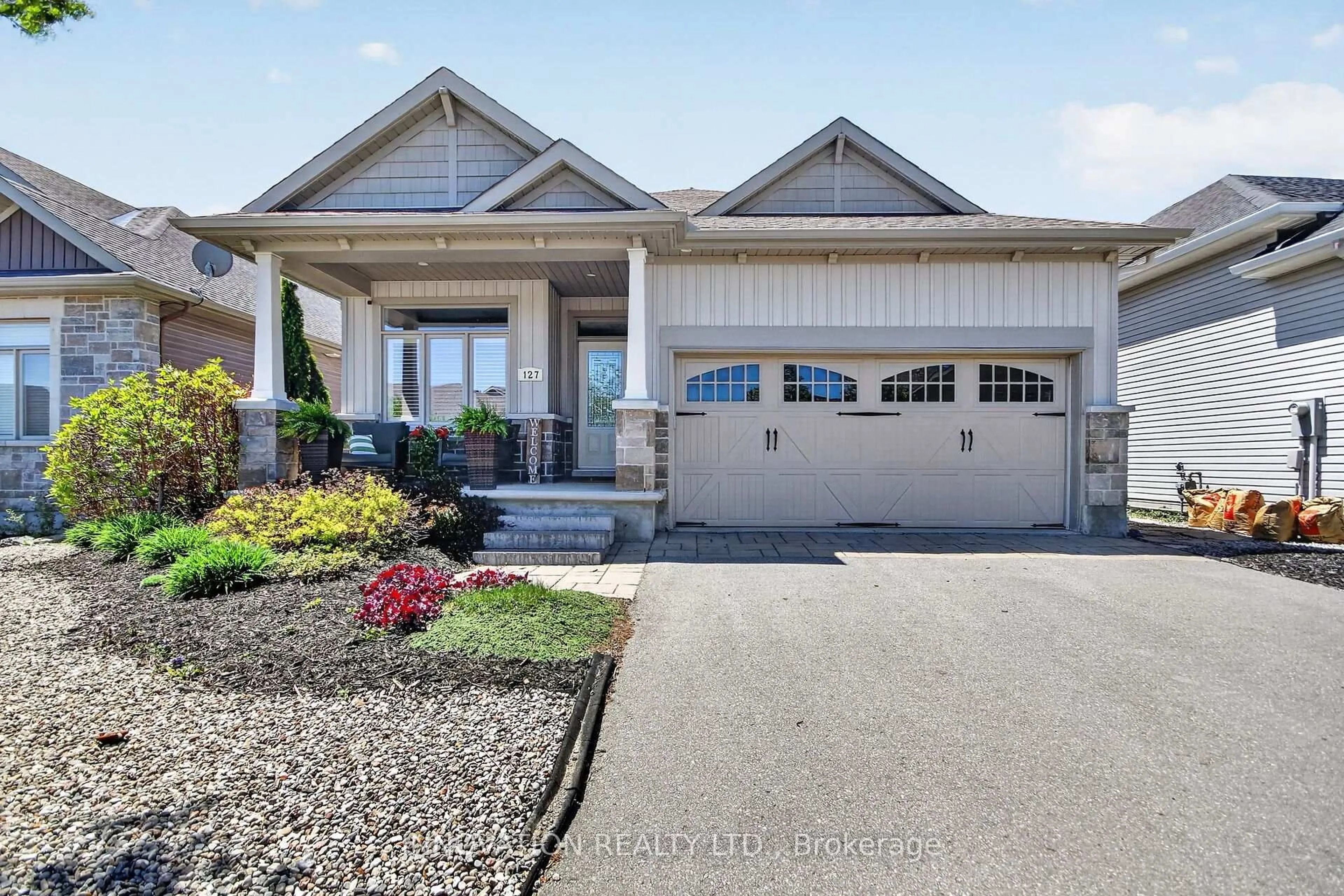 Home with vinyl exterior material, street for 127 Elfin Grve, Ottawa Ontario K2V 0B9