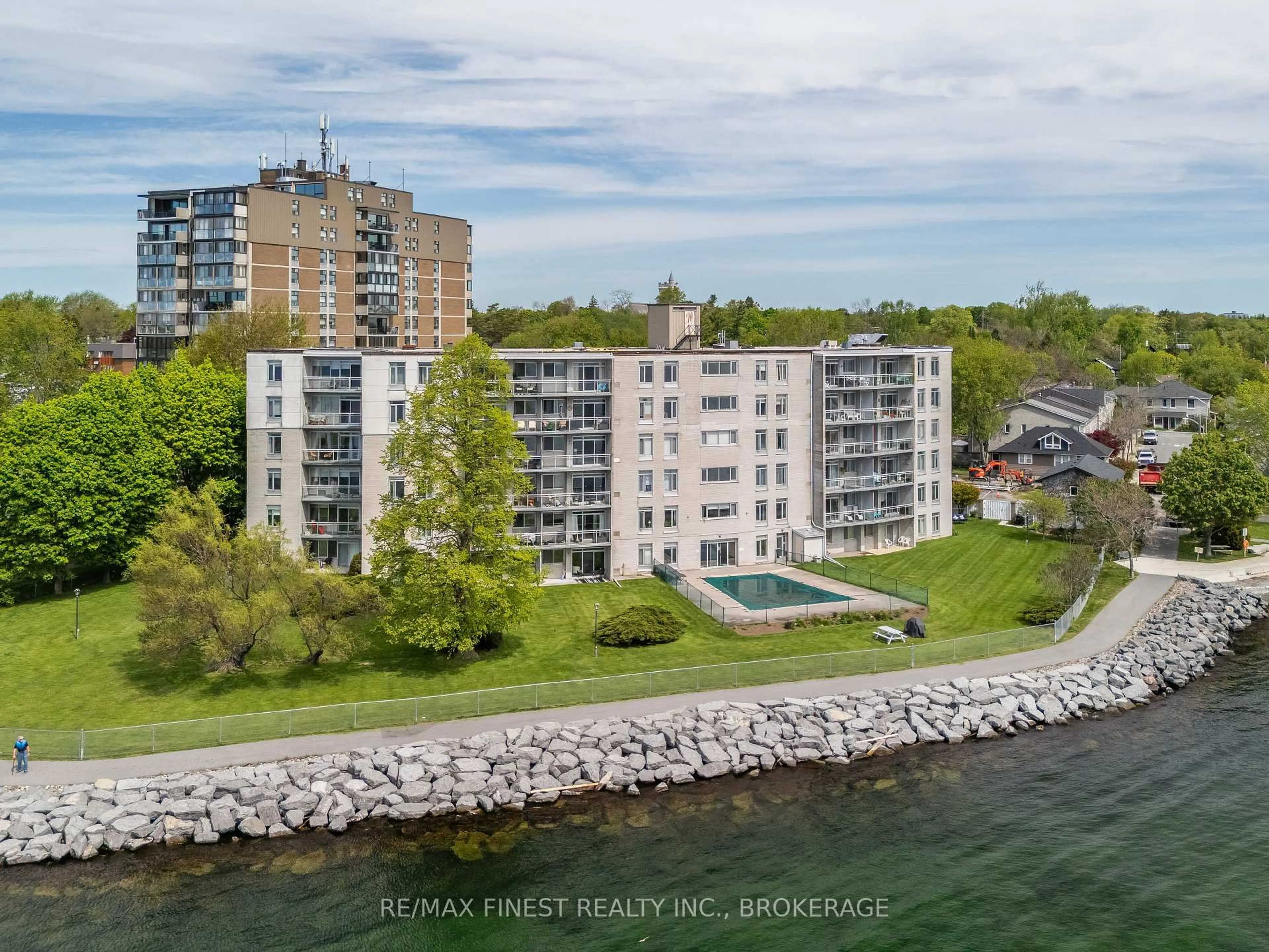 A pic from outside/outdoor area/front of a property/back of a property/a pic from drone, water/lake/river/ocean view for 1 Mowat Ave #105, Kingston Ontario K7M 1J8