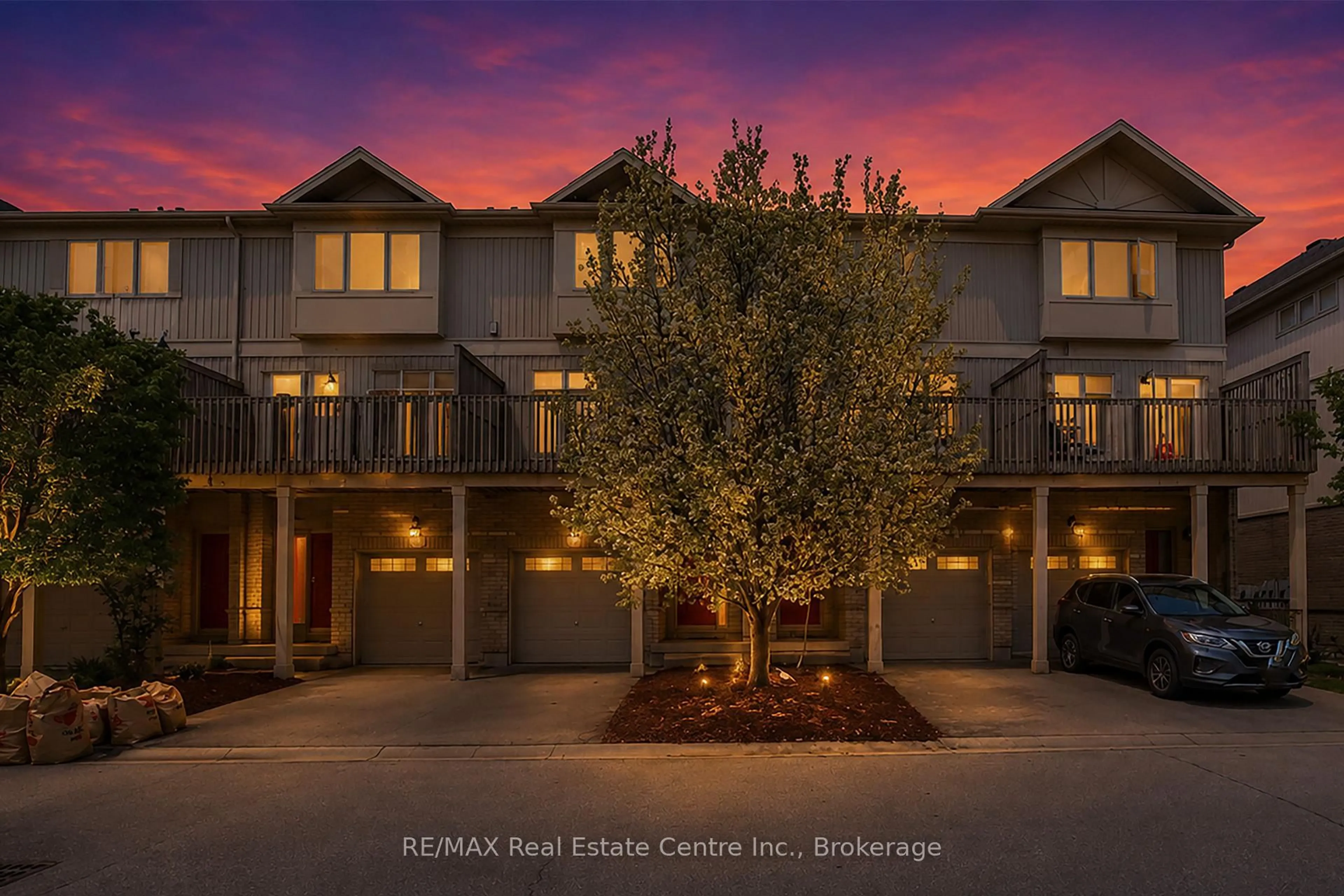 A pic from outside/outdoor area/front of a property/back of a property/a pic from drone, street for 619 Wild Ginger Ave #C15, Waterloo Ontario N2V 2X1