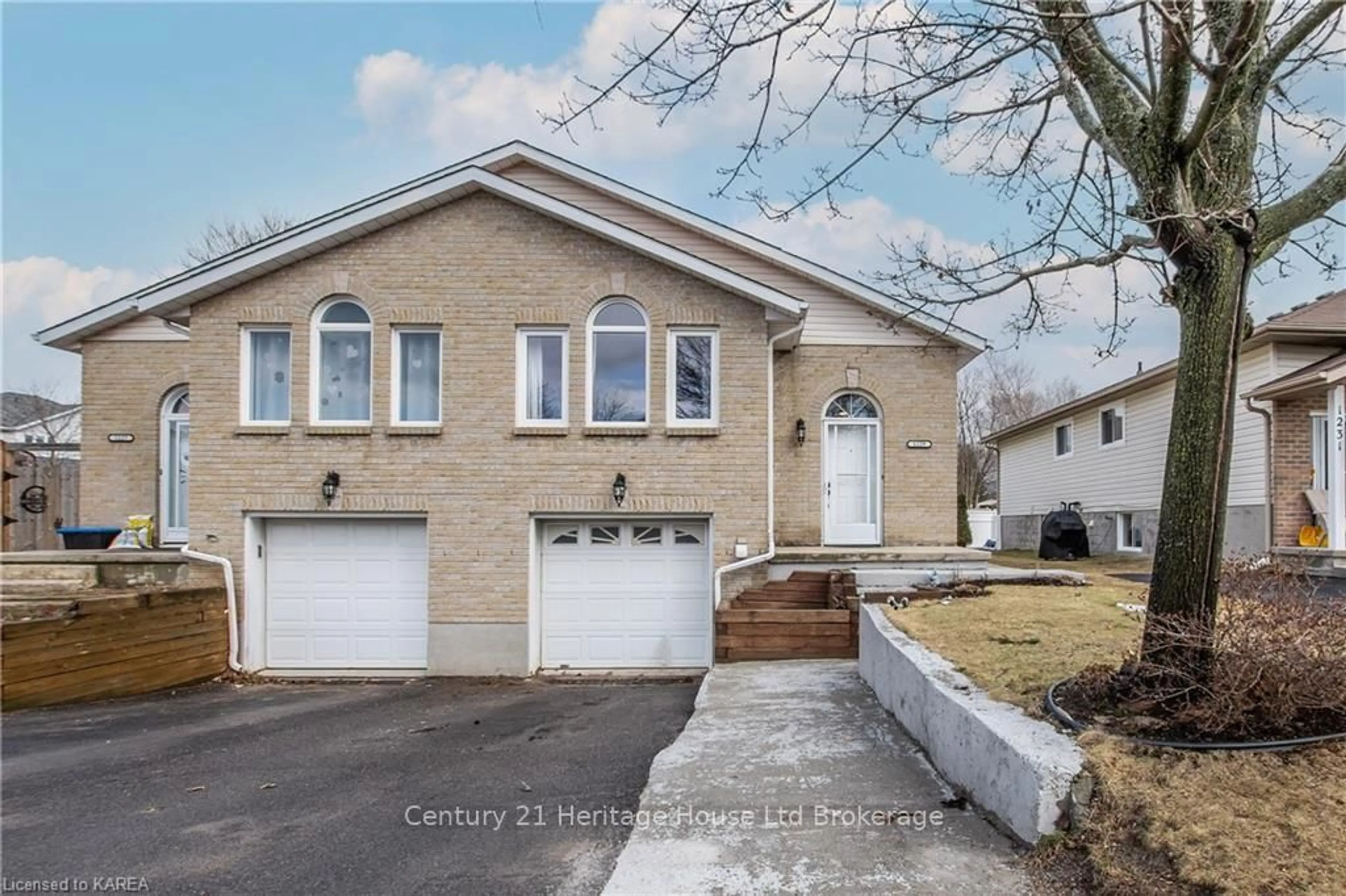 Home with vinyl exterior material, street for 1229 Brackenwood Cres, Kingston Ontario K7P 2W4