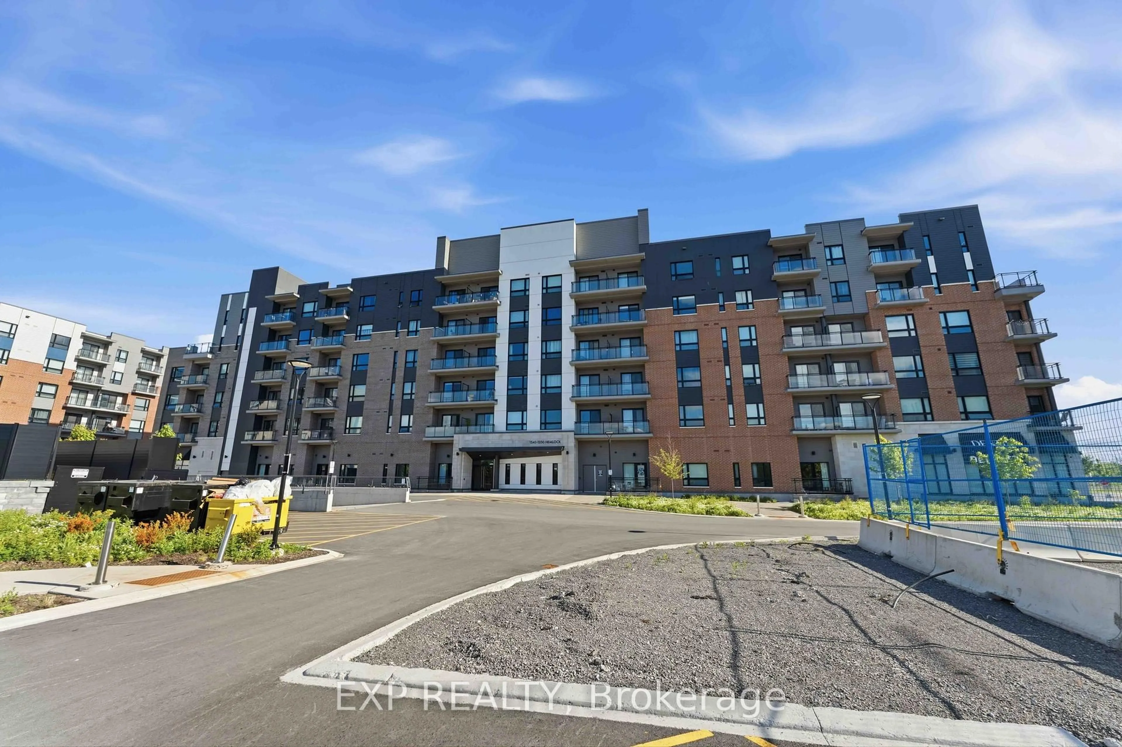 A pic from outside/outdoor area/front of a property/back of a property/a pic from drone, unknown for 1350 Hemlock Rd #505, Ottawa Ontario K1K 5C2