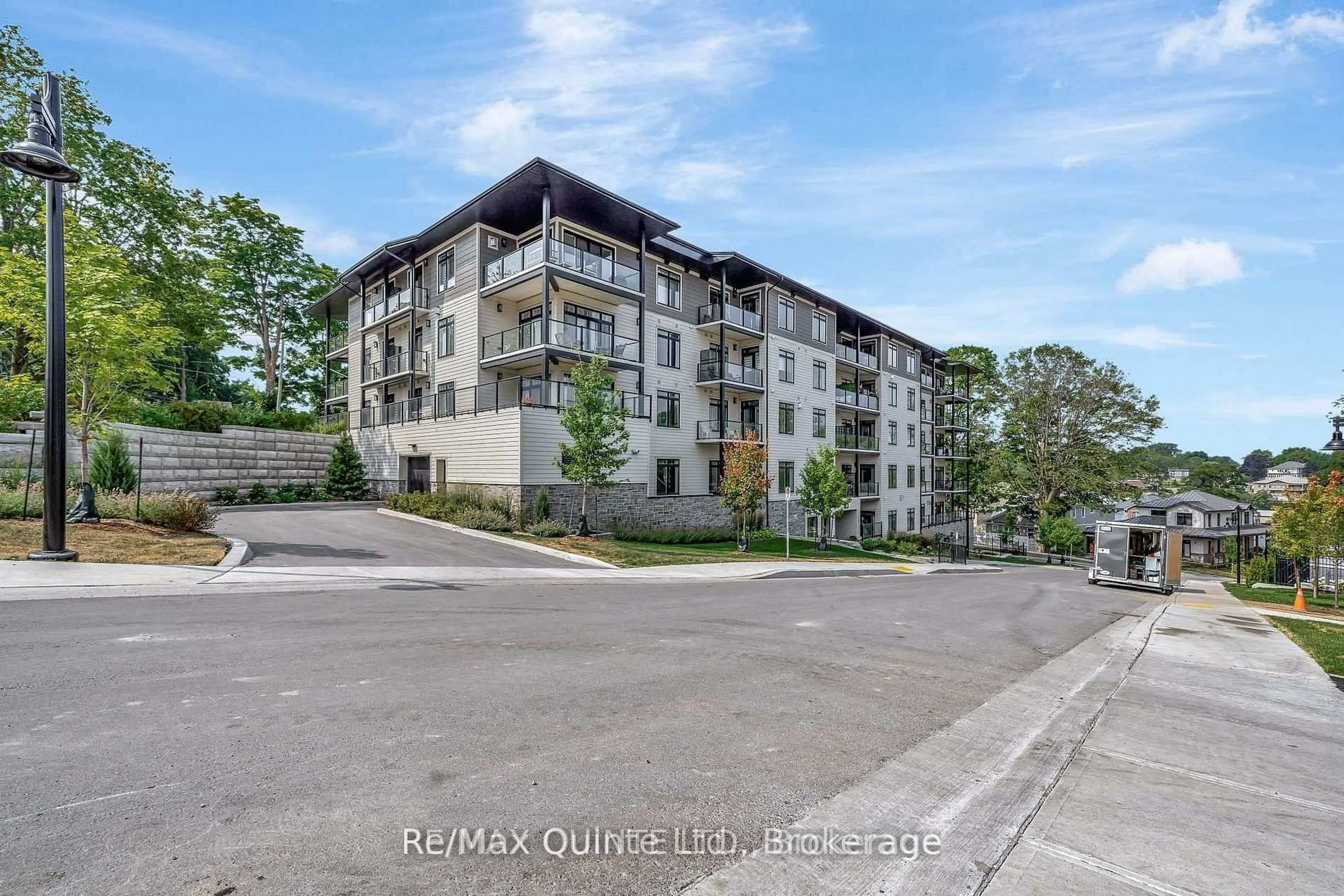 A pic from outside/outdoor area/front of a property/back of a property/a pic from drone, water/lake/river/ocean view for 17 Cleave Ave #509, Prince Edward County Ontario K0K 2T0