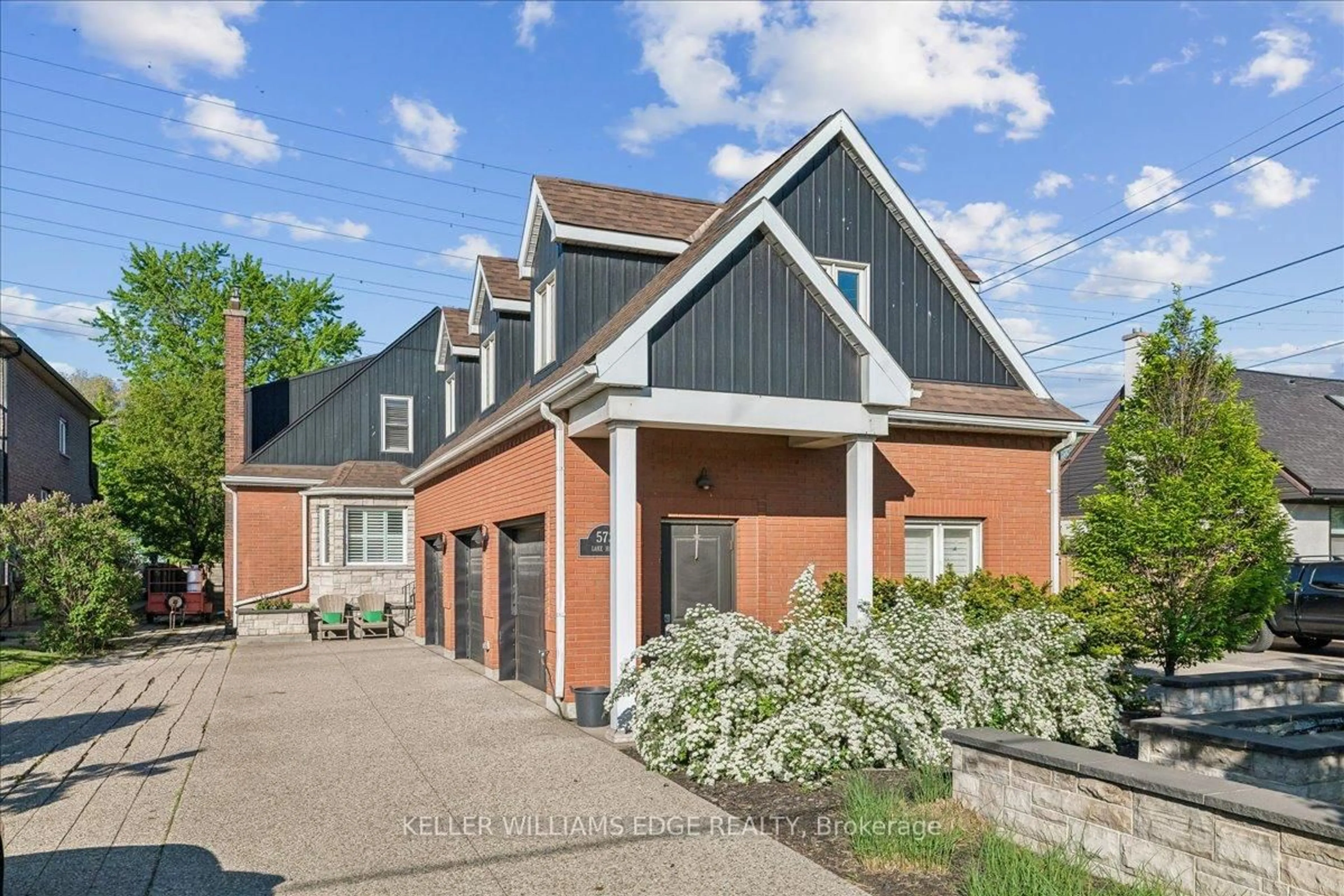 Home with brick exterior material, street for 573 Beach Blvd, Hamilton Ontario L8H 6X8