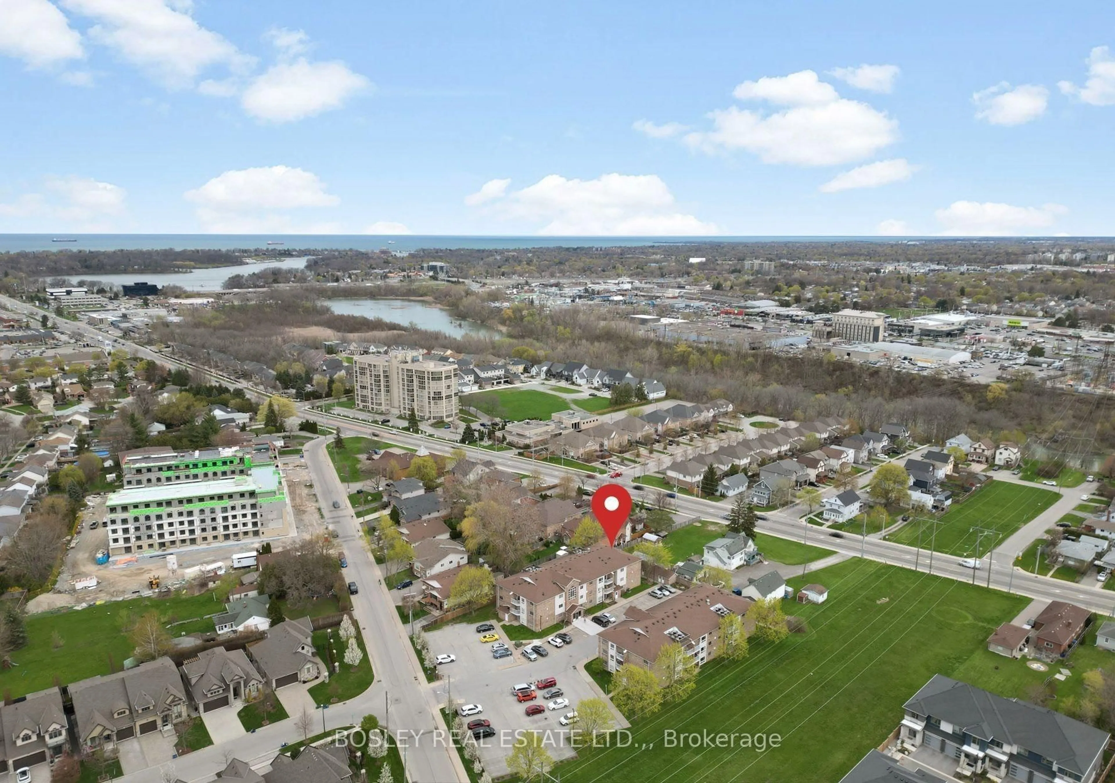 A pic from outside/outdoor area/front of a property/back of a property/a pic from drone, water/lake/river/ocean view for 1061 Vansickle Rd #205A, St. Catharines Ontario L2S 2X4