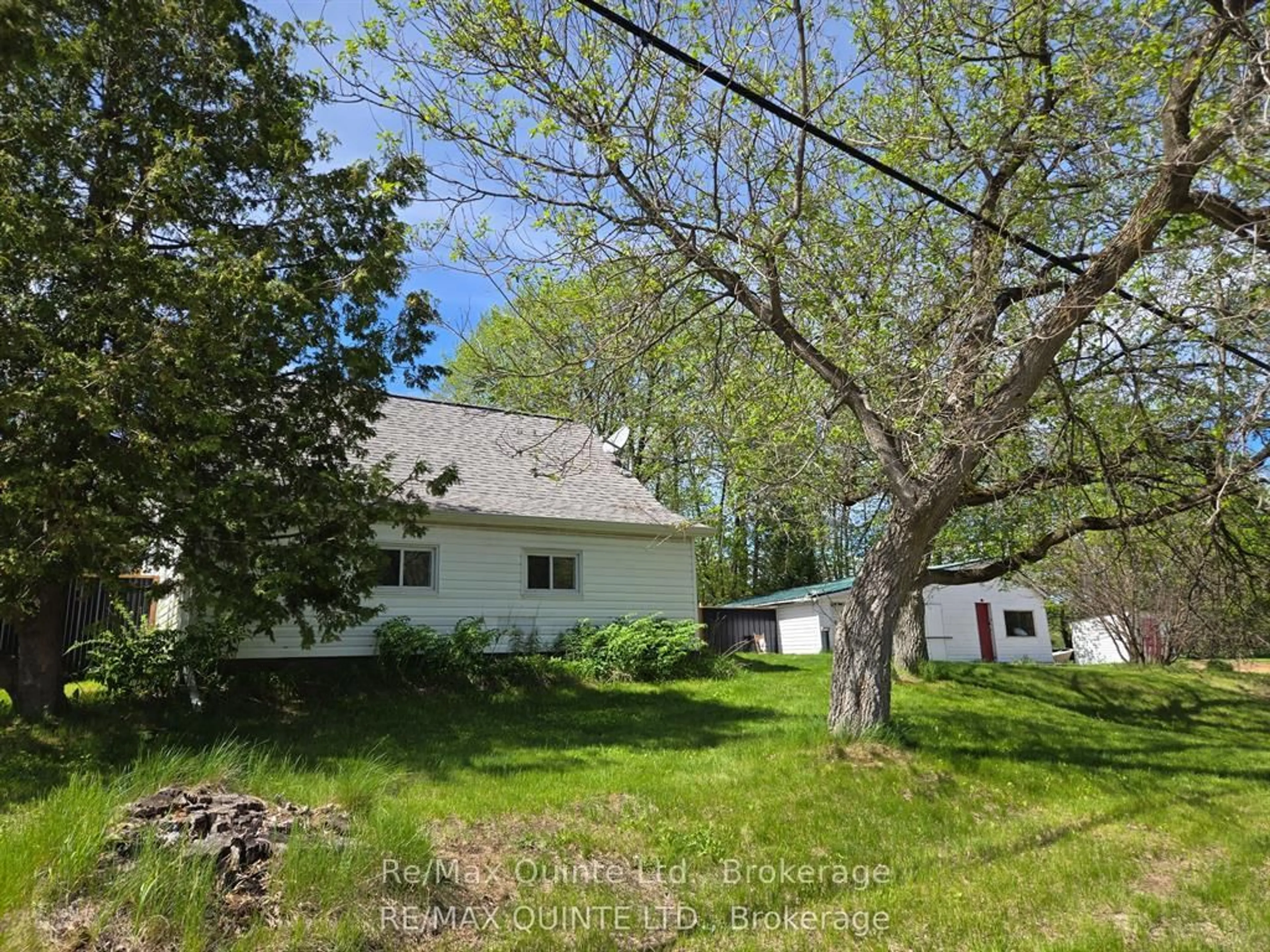 A pic from outside/outdoor area/front of a property/back of a property/a pic from drone, forest/trees view for 112959 Highway 7 Highway, Kaladar Ontario K0H 1Z0