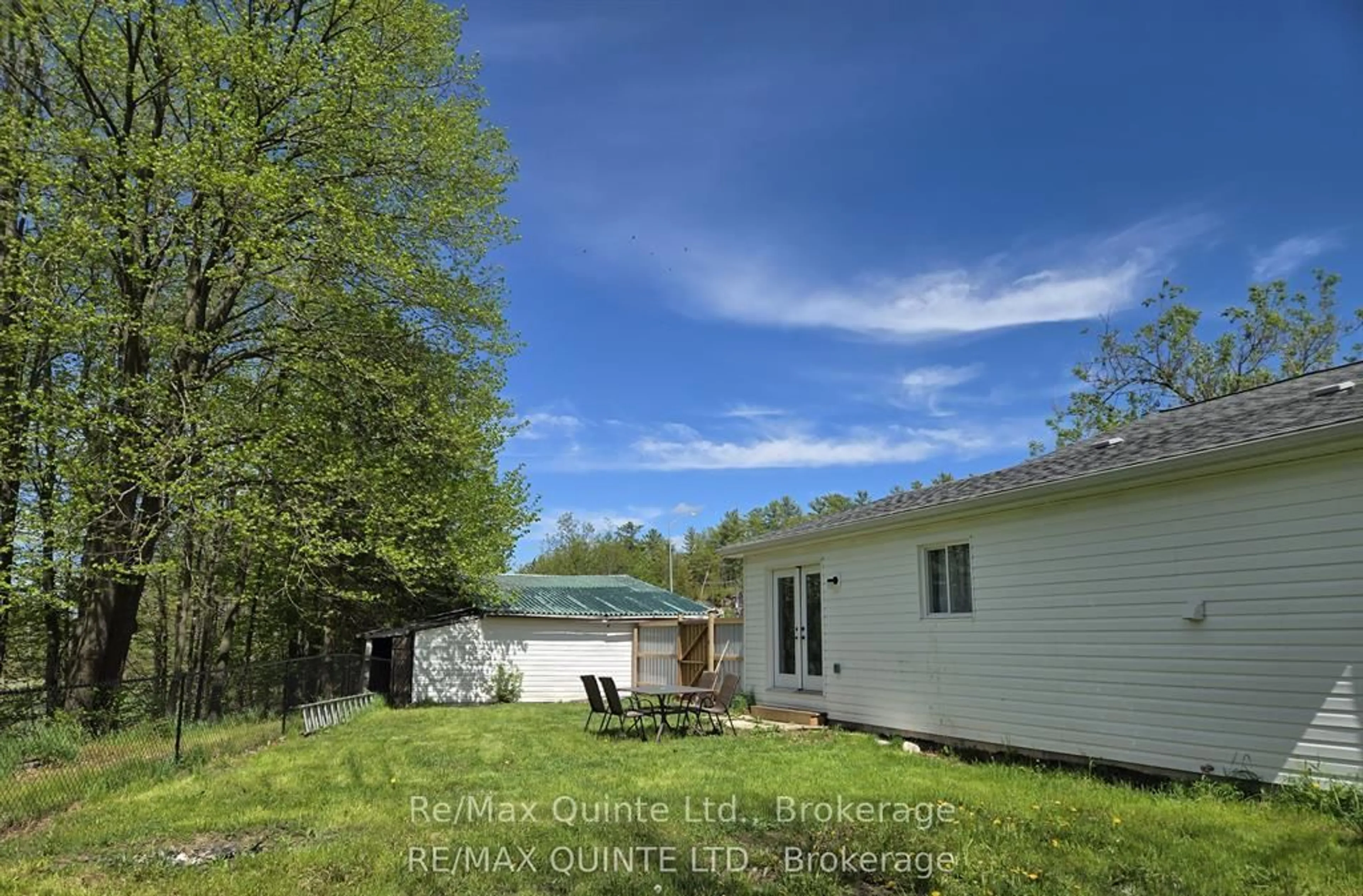 A pic from outside/outdoor area/front of a property/back of a property/a pic from drone, water/lake/river/ocean view for 112959 Highway 7 Highway, Kaladar Ontario K0H 1Z0