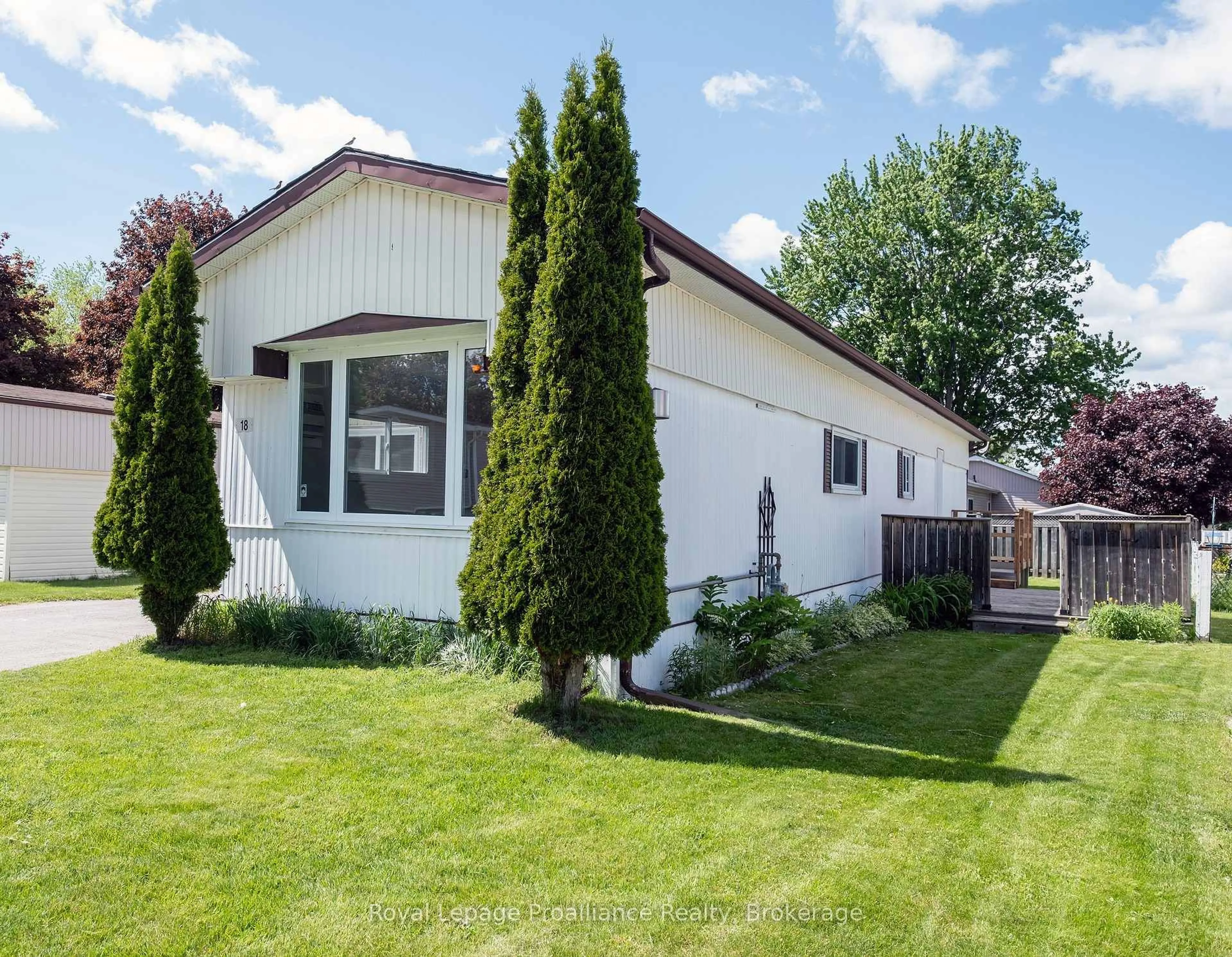 Home with vinyl exterior material, street for 18 Finch Lane, Quinte West Ontario K8N 4Z3