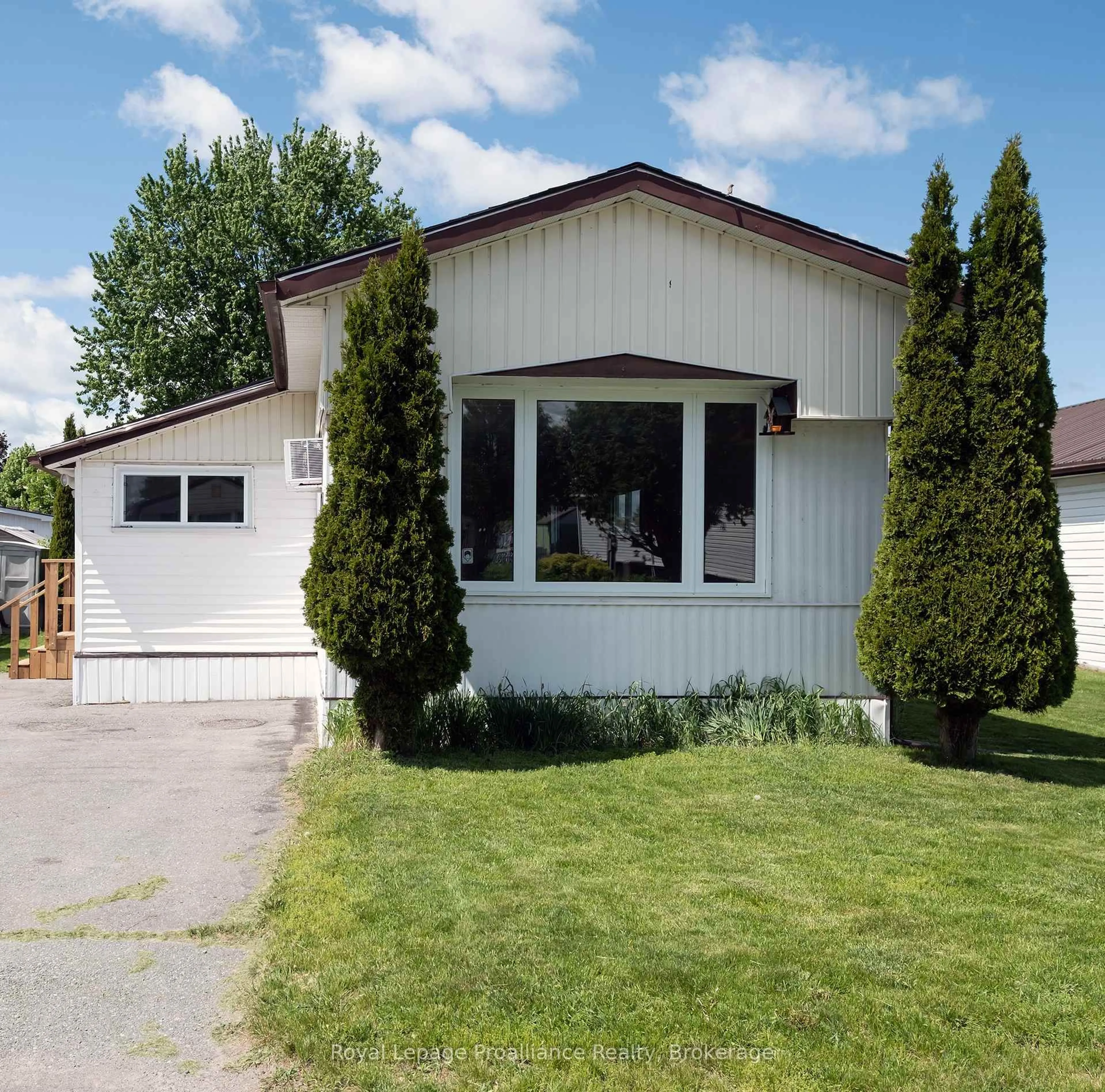 Home with vinyl exterior material, street for 18 Finch Lane, Quinte West Ontario K8N 4Z3
