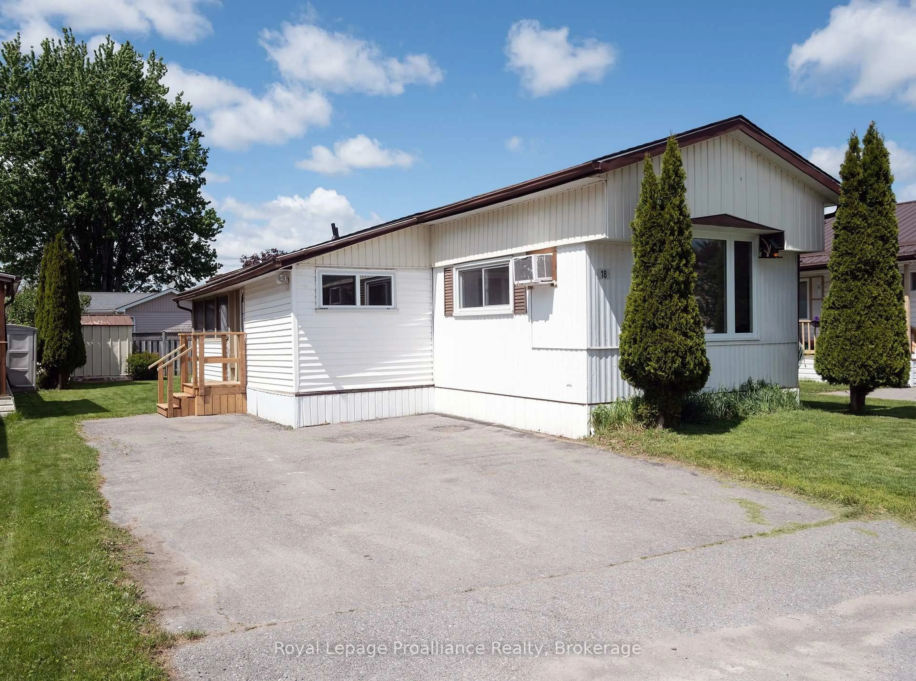 Home with vinyl exterior material, street for 18 Finch Lane, Quinte West Ontario K8N 4Z3