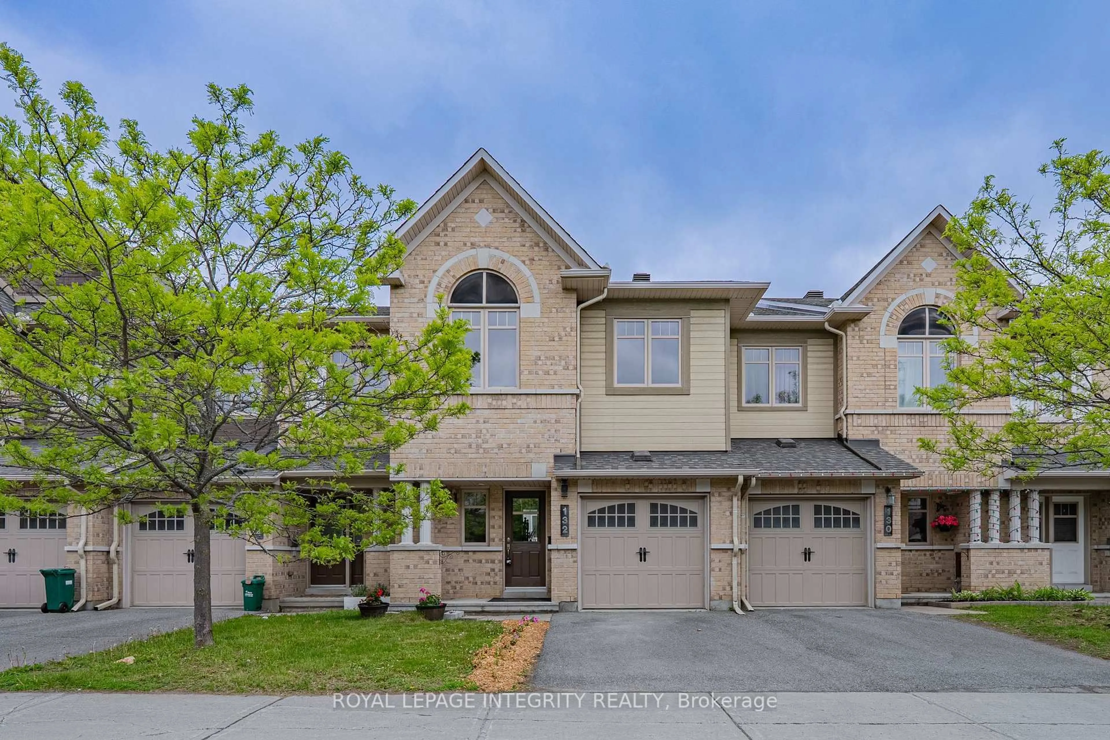 Home with brick exterior material, street for 132 Mancini Way, Ottawa Ontario K2J 3V1