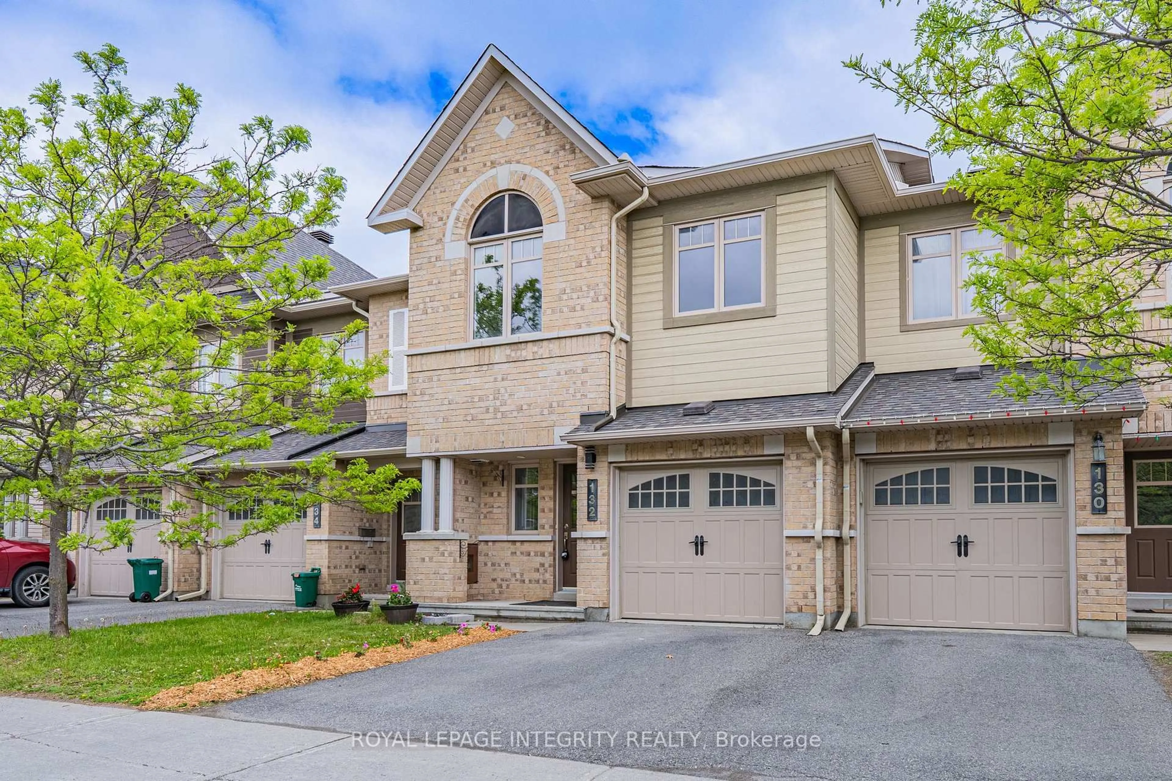 Home with brick exterior material, street for 132 Mancini Way, Ottawa Ontario K2J 3V1