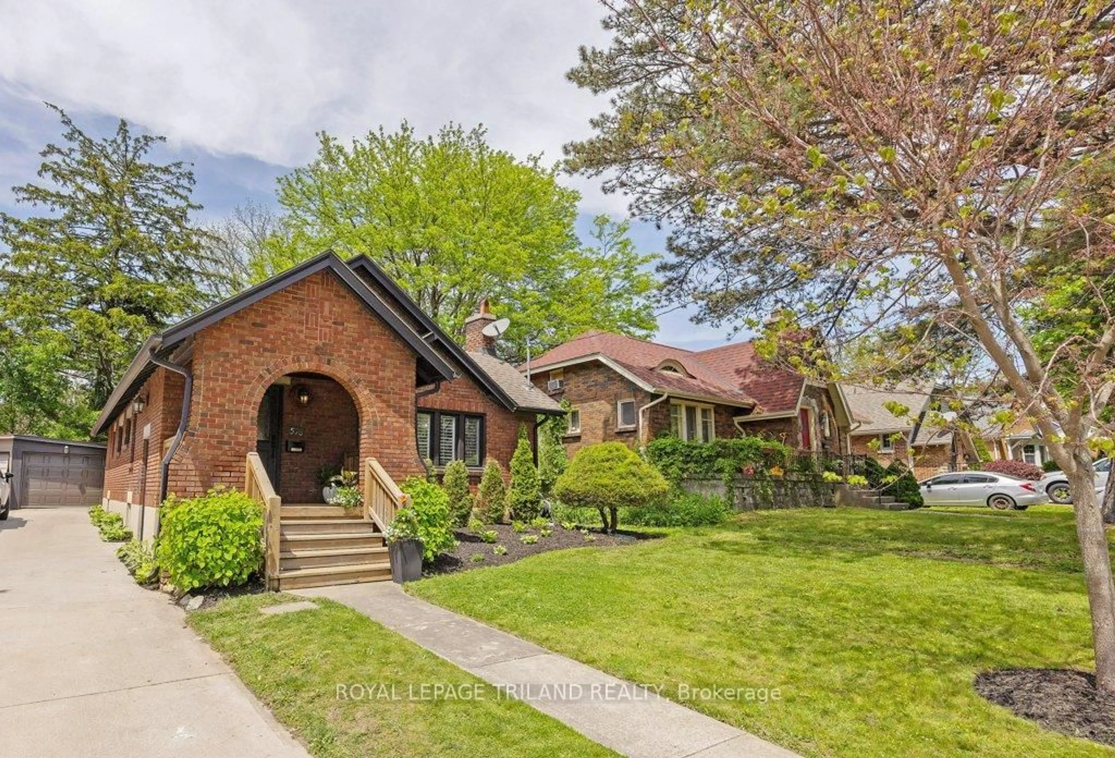 Home with brick exterior material, street for 576 St James St, London East Ontario N5Y 3P6