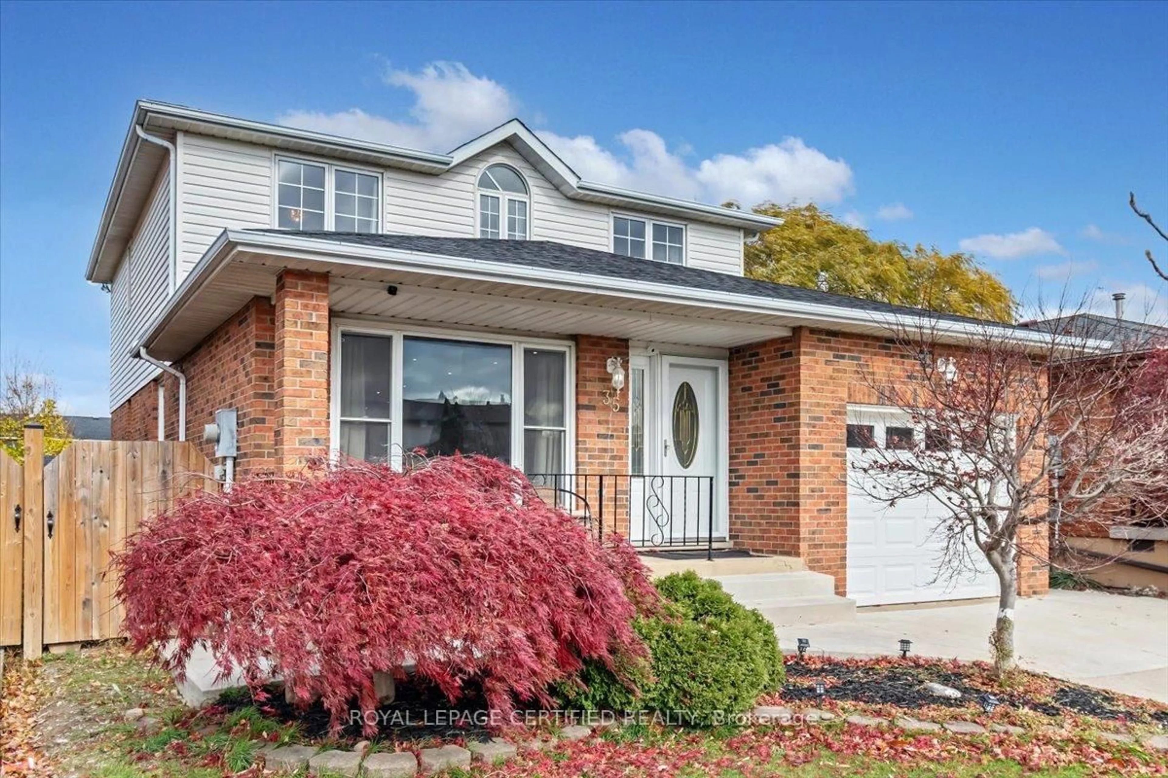Home with brick exterior material, street for 35 Trenholme Cres, Hamilton Ontario L8W 2L4