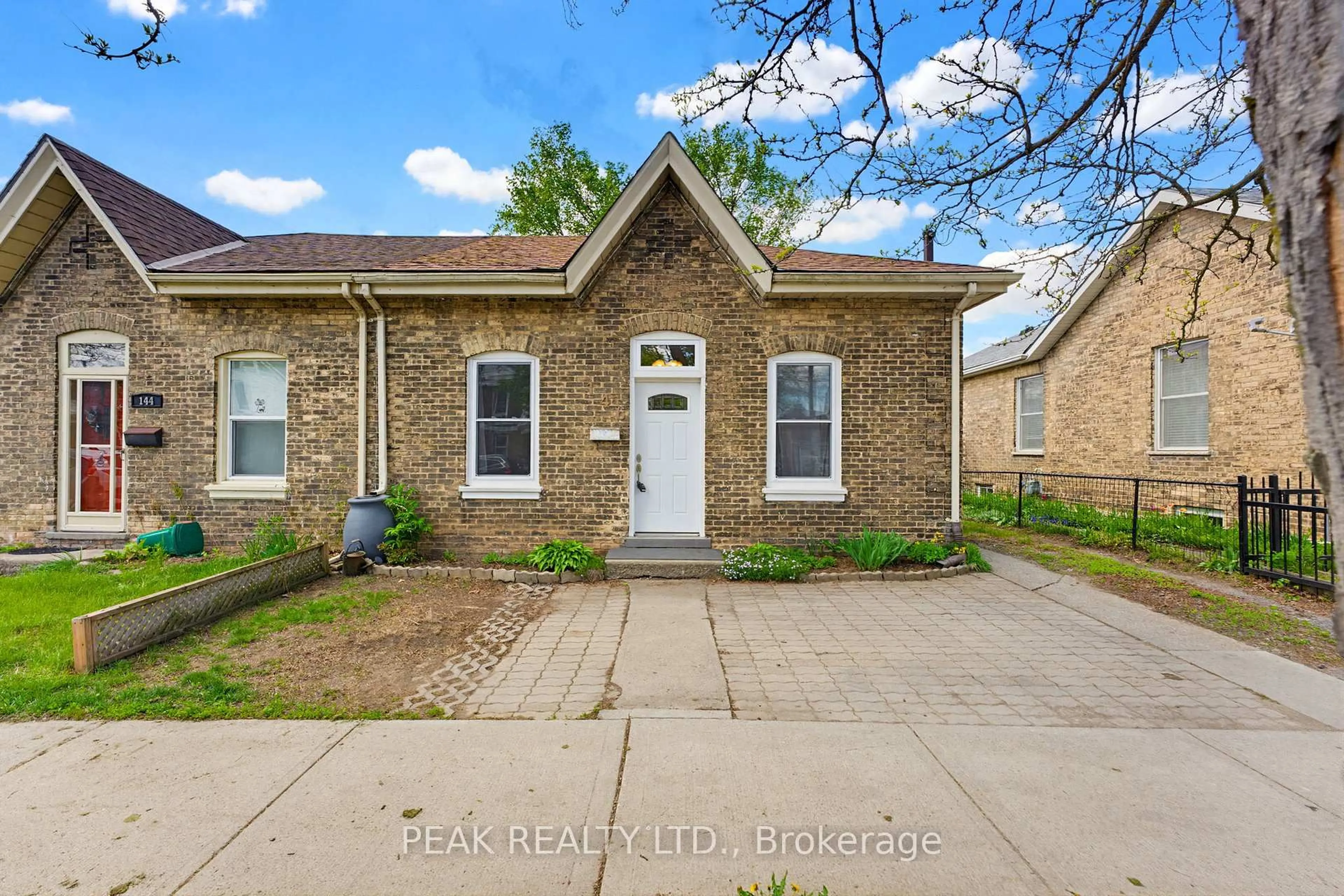 Home with brick exterior material, street for 146 William St, Brantford Ontario N3T 3L3