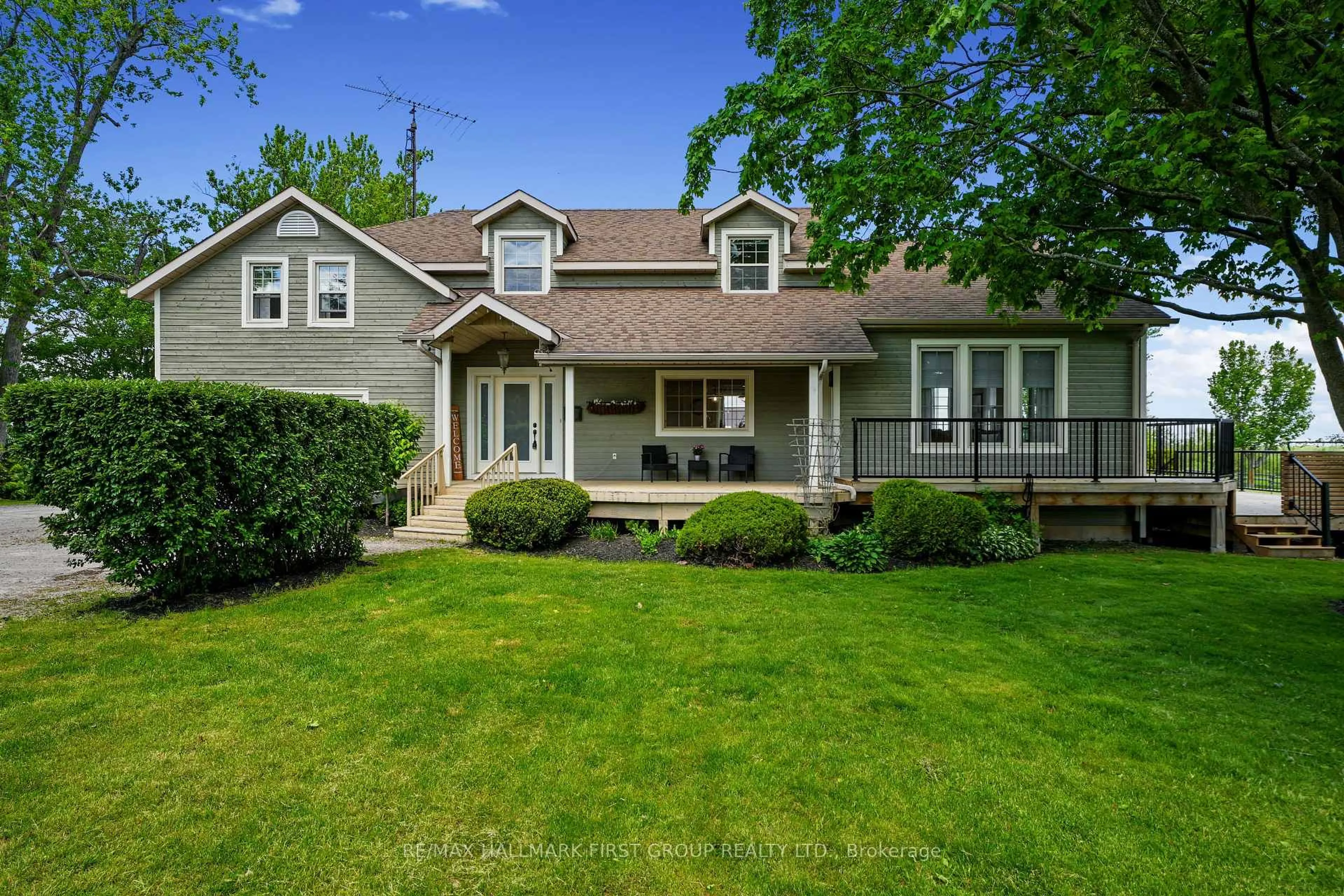 Home with vinyl exterior material, street for 100 County 2 Rd, Otonabee-South Monaghan Ontario L0A 1G0