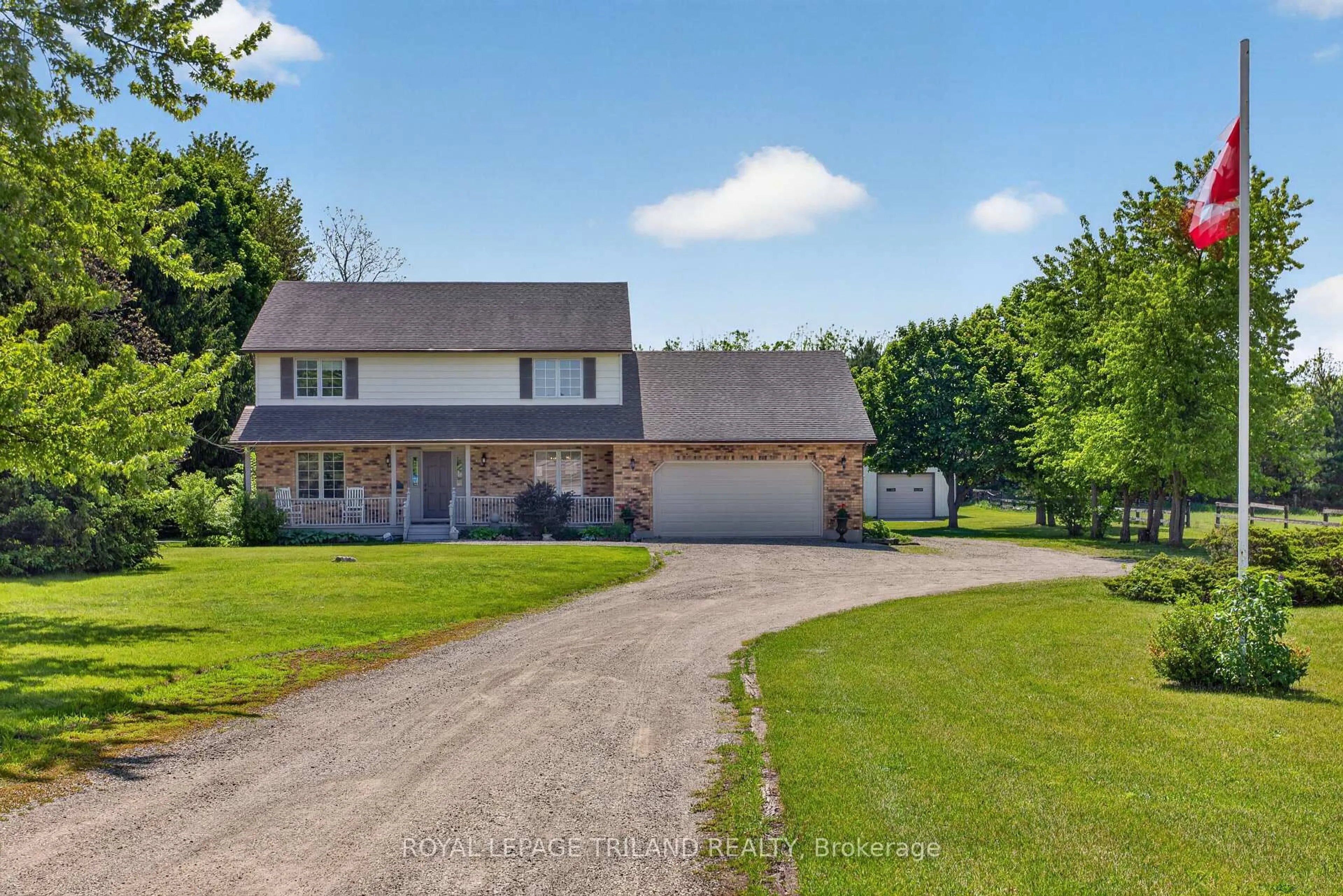 A pic from outside/outdoor area/front of a property/back of a property/a pic from drone, street for 8651 Irish Dr, Strathroy-Caradoc Ontario N0L 1W0