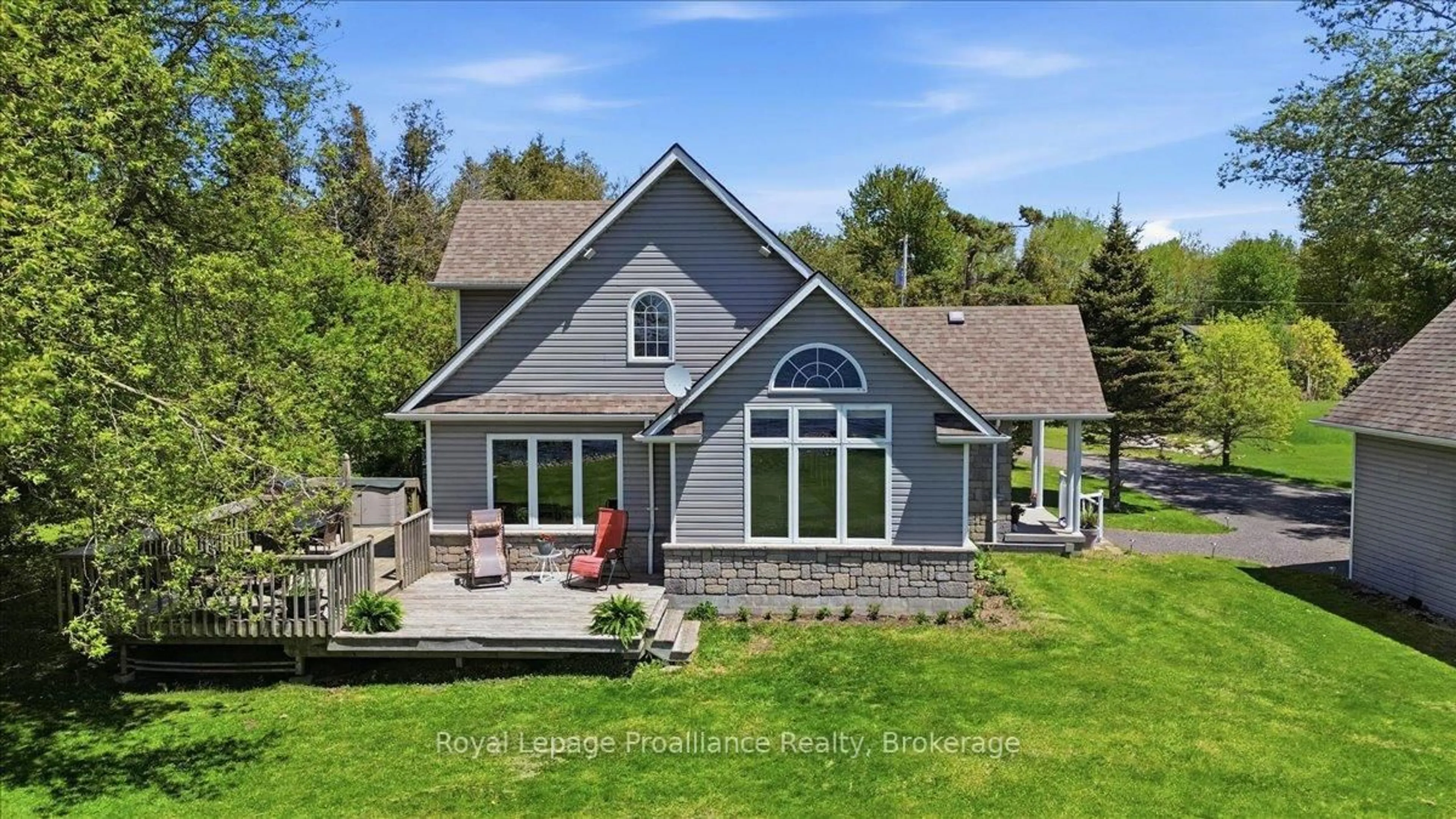 A pic from outside/outdoor area/front of a property/back of a property/a pic from drone, water/lake/river/ocean view for 233 Parkview Rd, Prince Edward County Ontario K0K 1L0