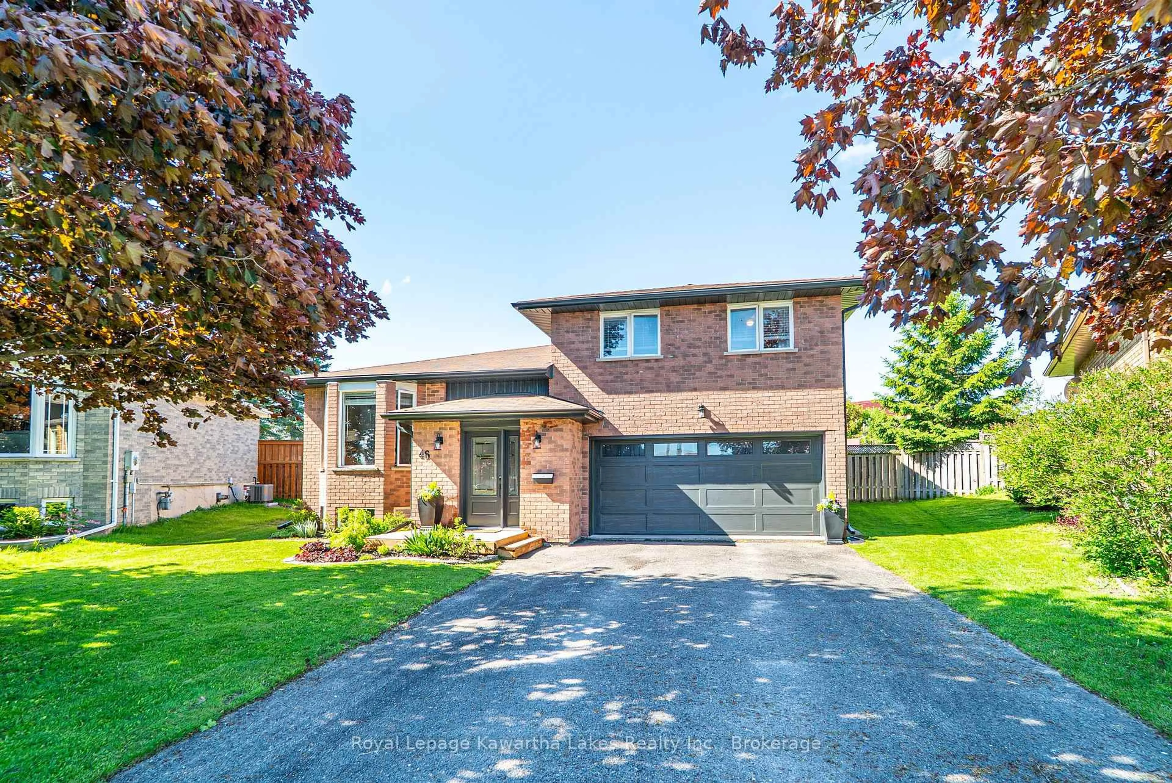 Home with brick exterior material, street for 46 Madill Cres, Kawartha Lakes Ontario K9V 5X2