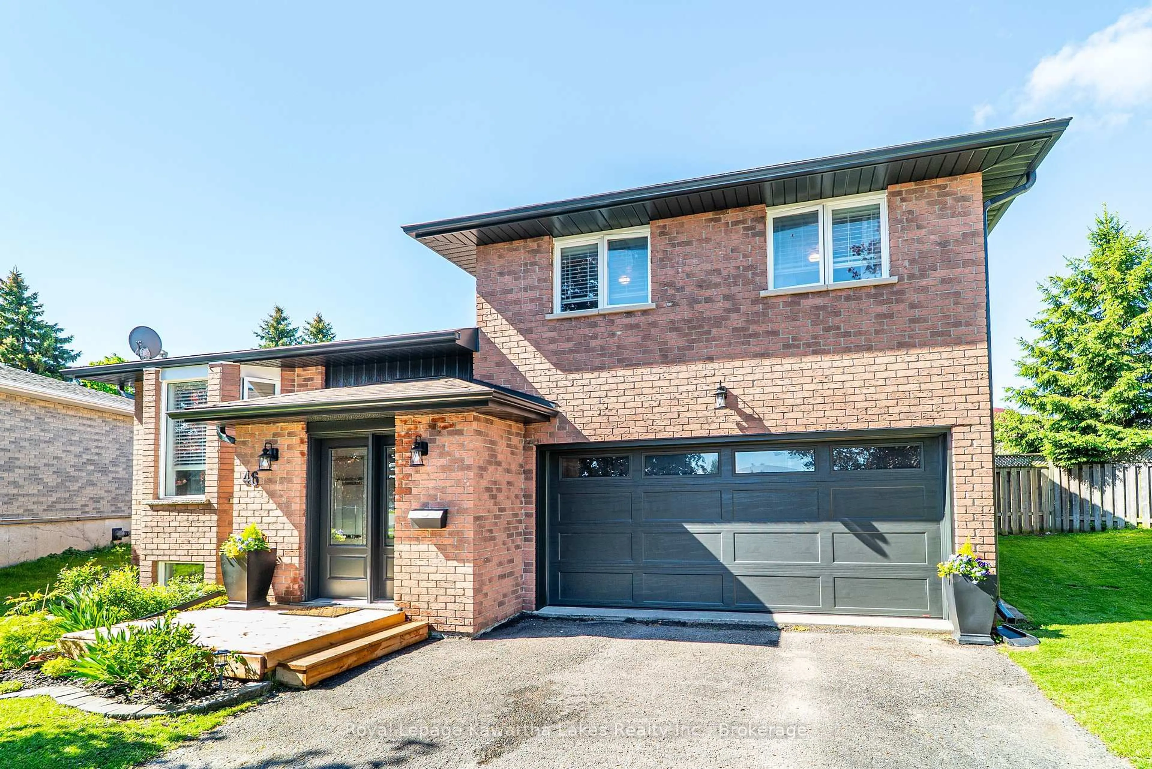 Home with brick exterior material, street for 46 Madill Cres, Kawartha Lakes Ontario K9V 5X2