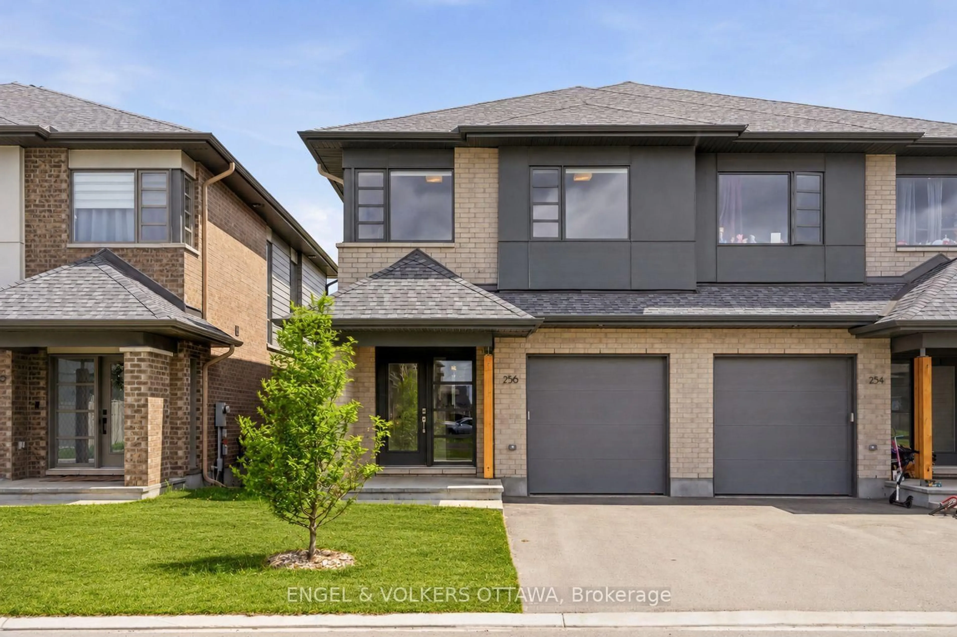 Home with brick exterior material, street for 256 Shuttleworth Dr, Ottawa Ontario K1T 0T4