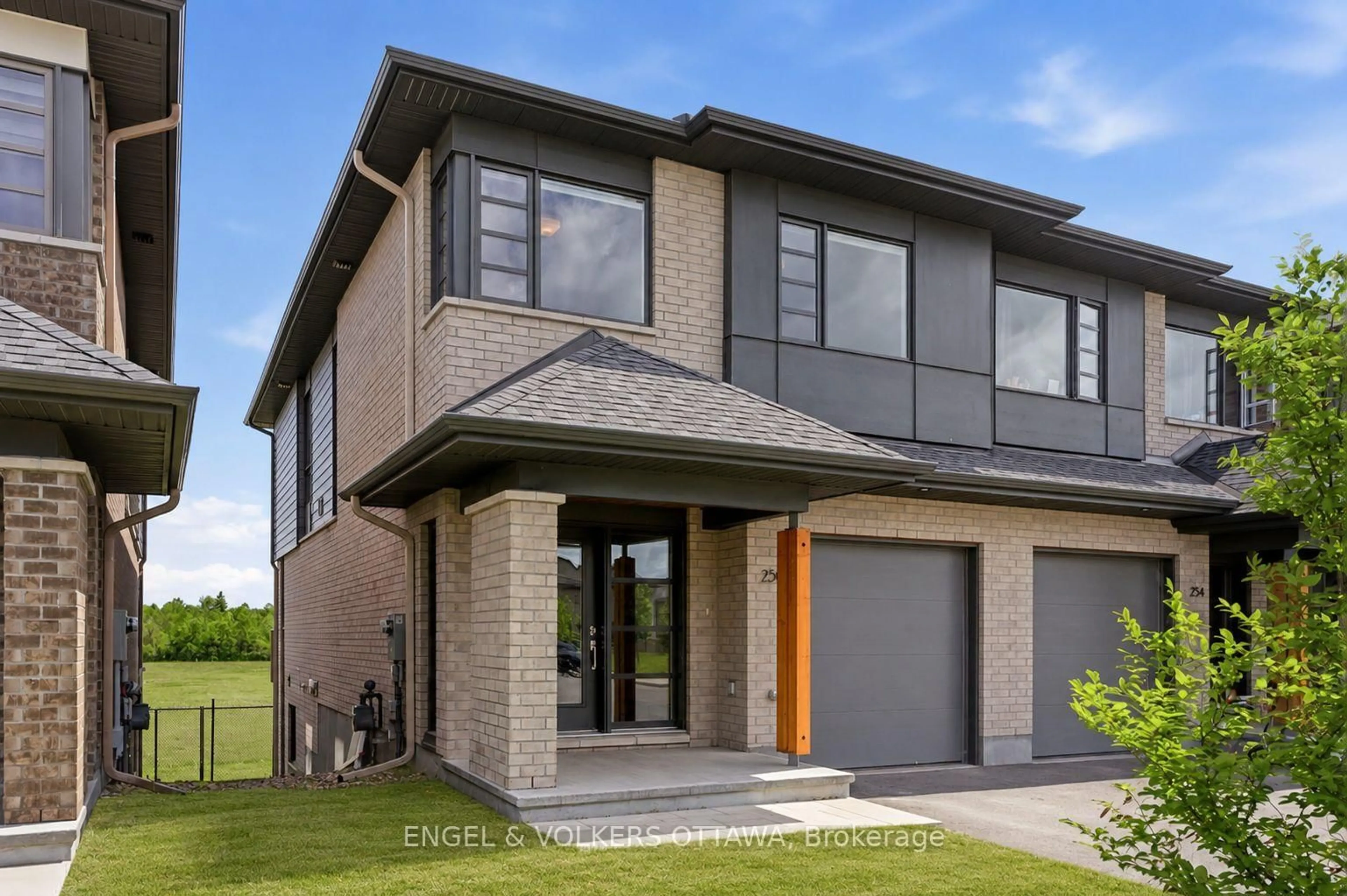 Home with brick exterior material, street for 256 Shuttleworth Dr, Ottawa Ontario K1T 0T4