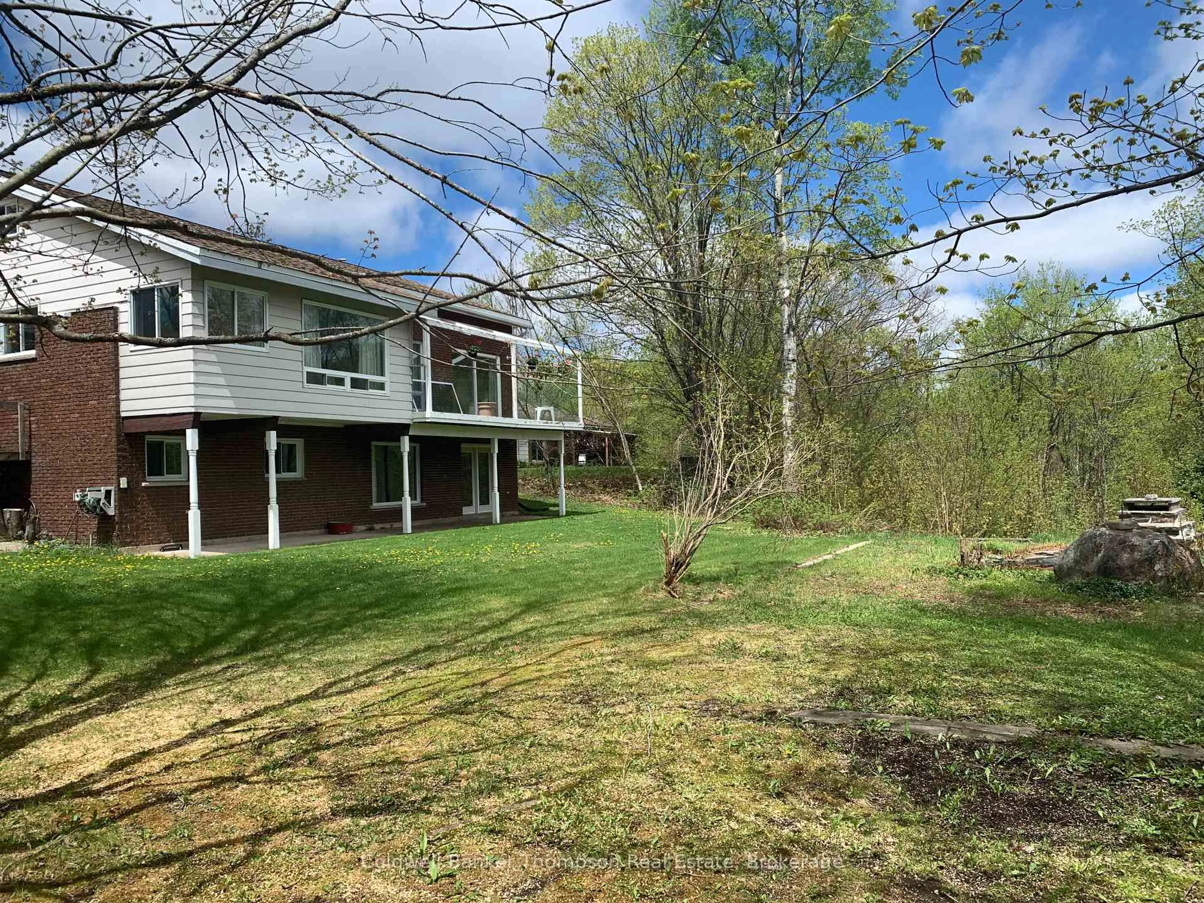 A pic from outside/outdoor area/front of a property/back of a property/a pic from drone, forest/trees view for 79 Oakridge Dr, Strong Ontario P0A 1Z0