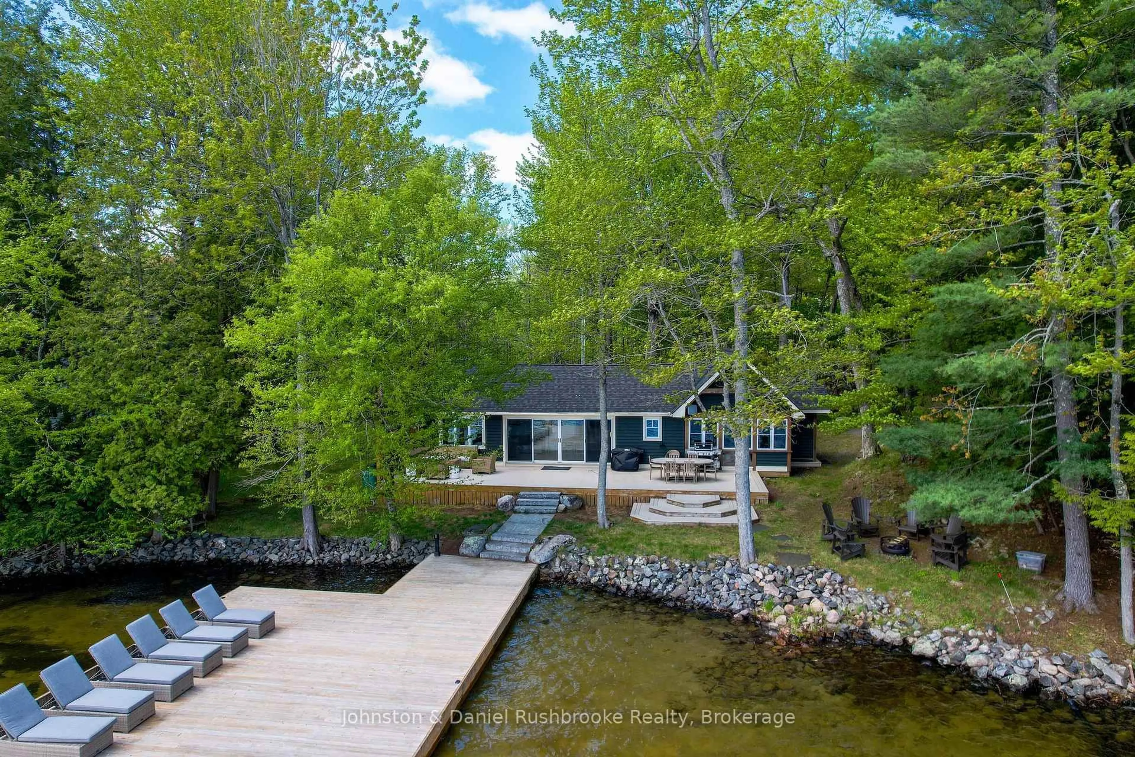 A pic from outside/outdoor area/front of a property/back of a property/a pic from drone, water/lake/river/ocean view for 1032 Island Park Rd #2, Muskoka Lakes Ontario P0B 1J0