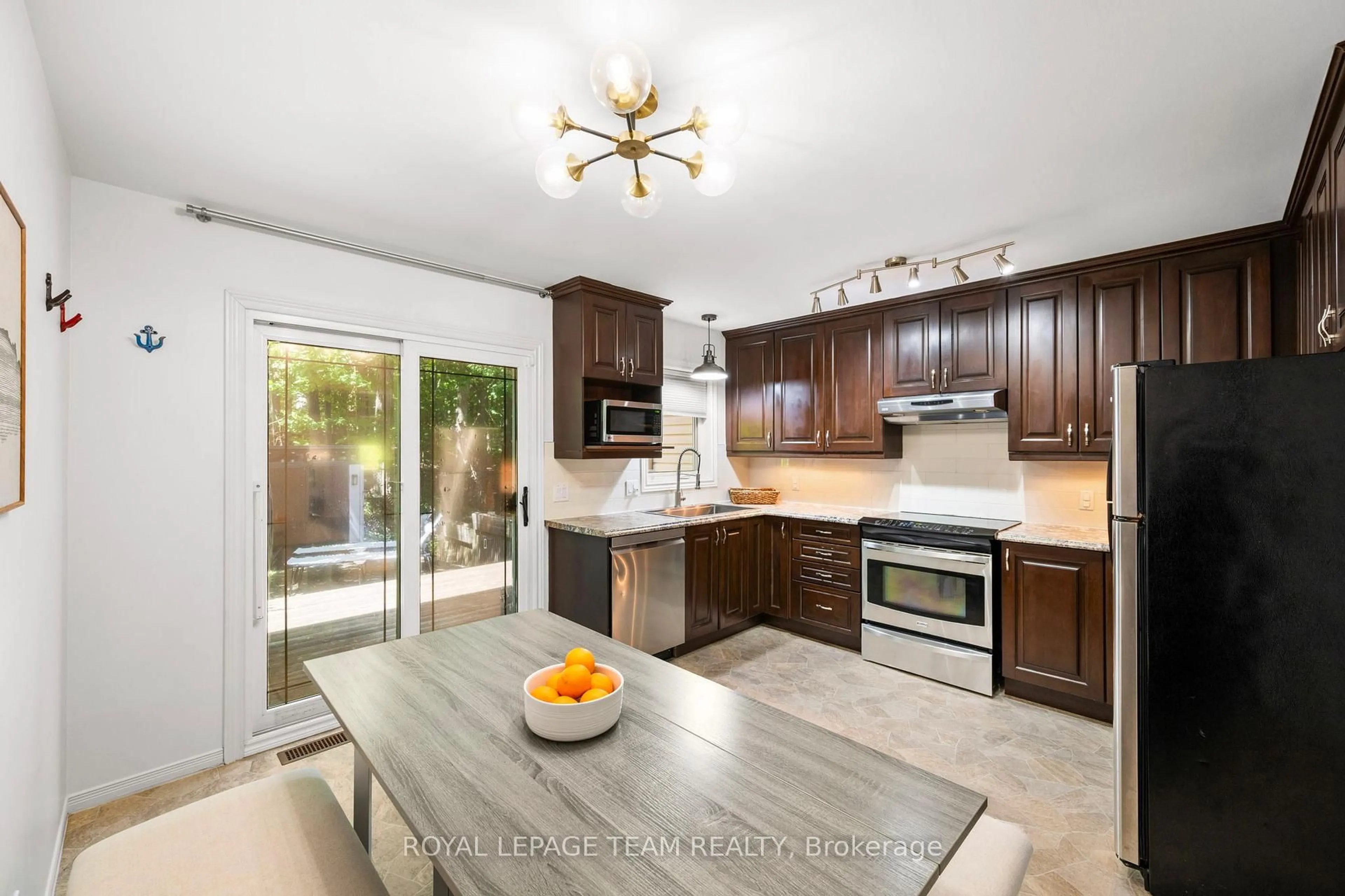 Open concept kitchen, ceramic/tile floor for 212 Provender Ave, Ottawa Ontario K1K 4N7