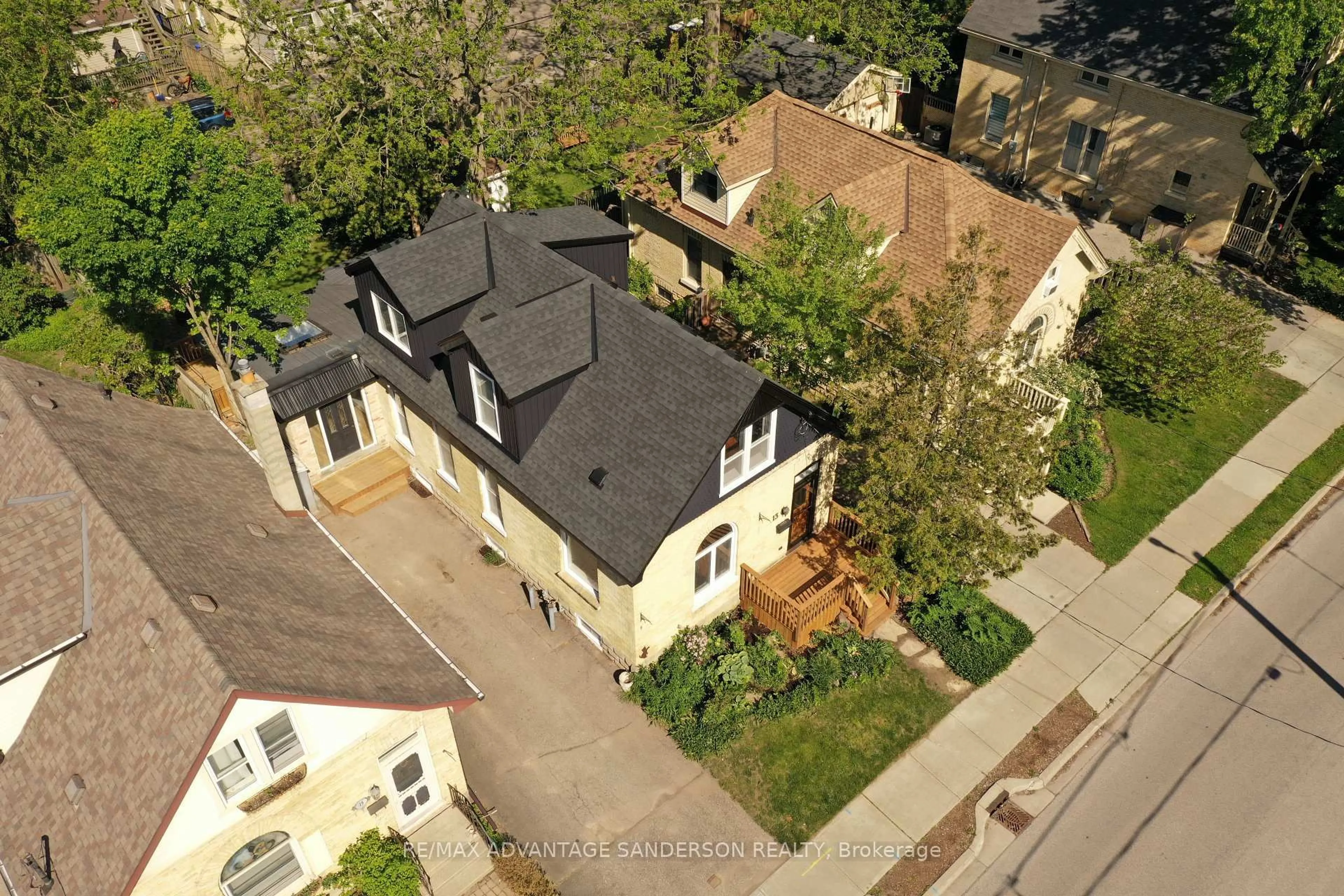 A pic from outside/outdoor area/front of a property/back of a property/a pic from drone, street for 13 Brighton St, London South Ontario N6C 3E3