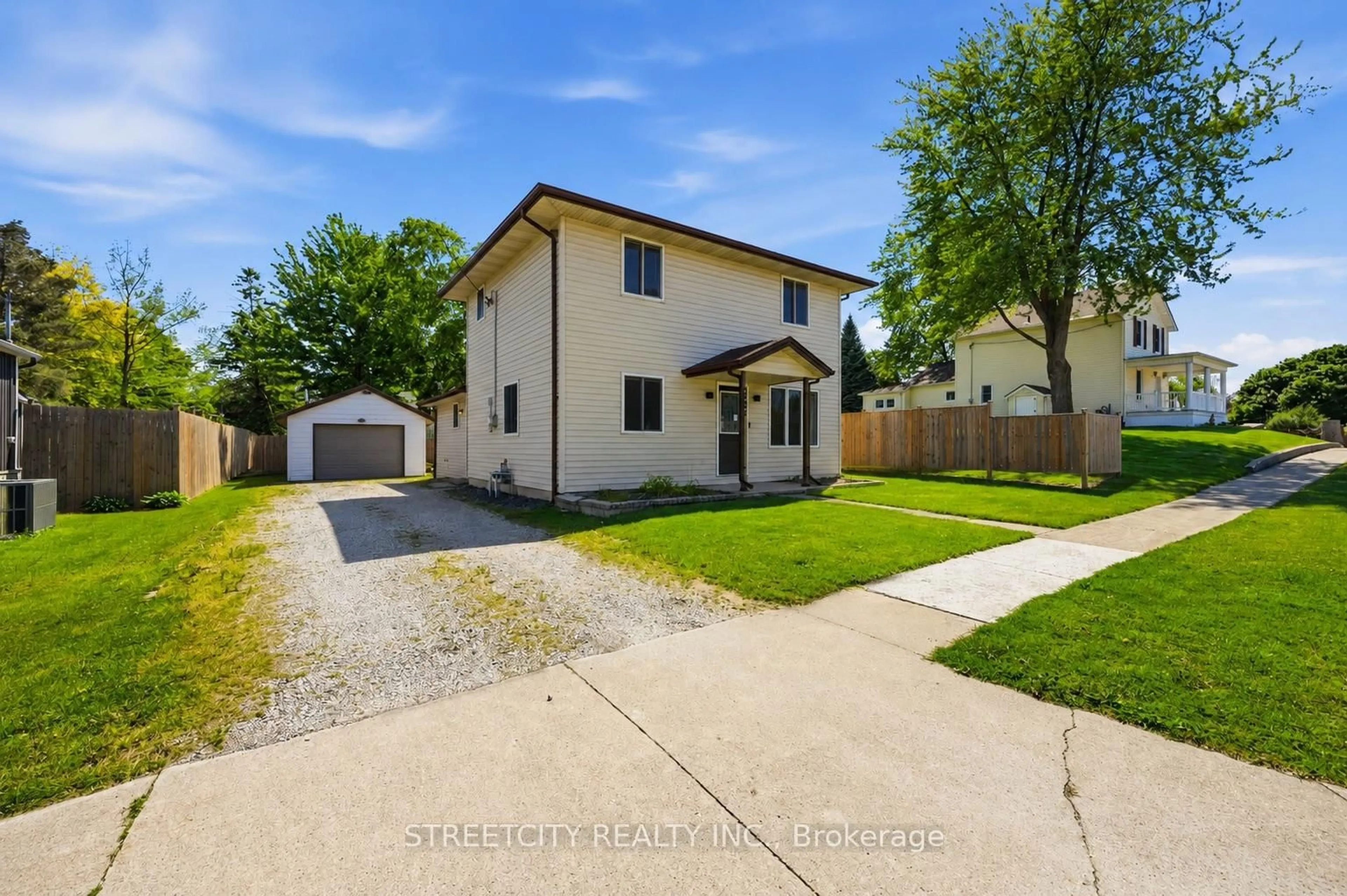 A pic from outside/outdoor area/front of a property/back of a property/a pic from drone, street for 502 Plympton St, Plympton-Wyoming Ontario N0N 1T0