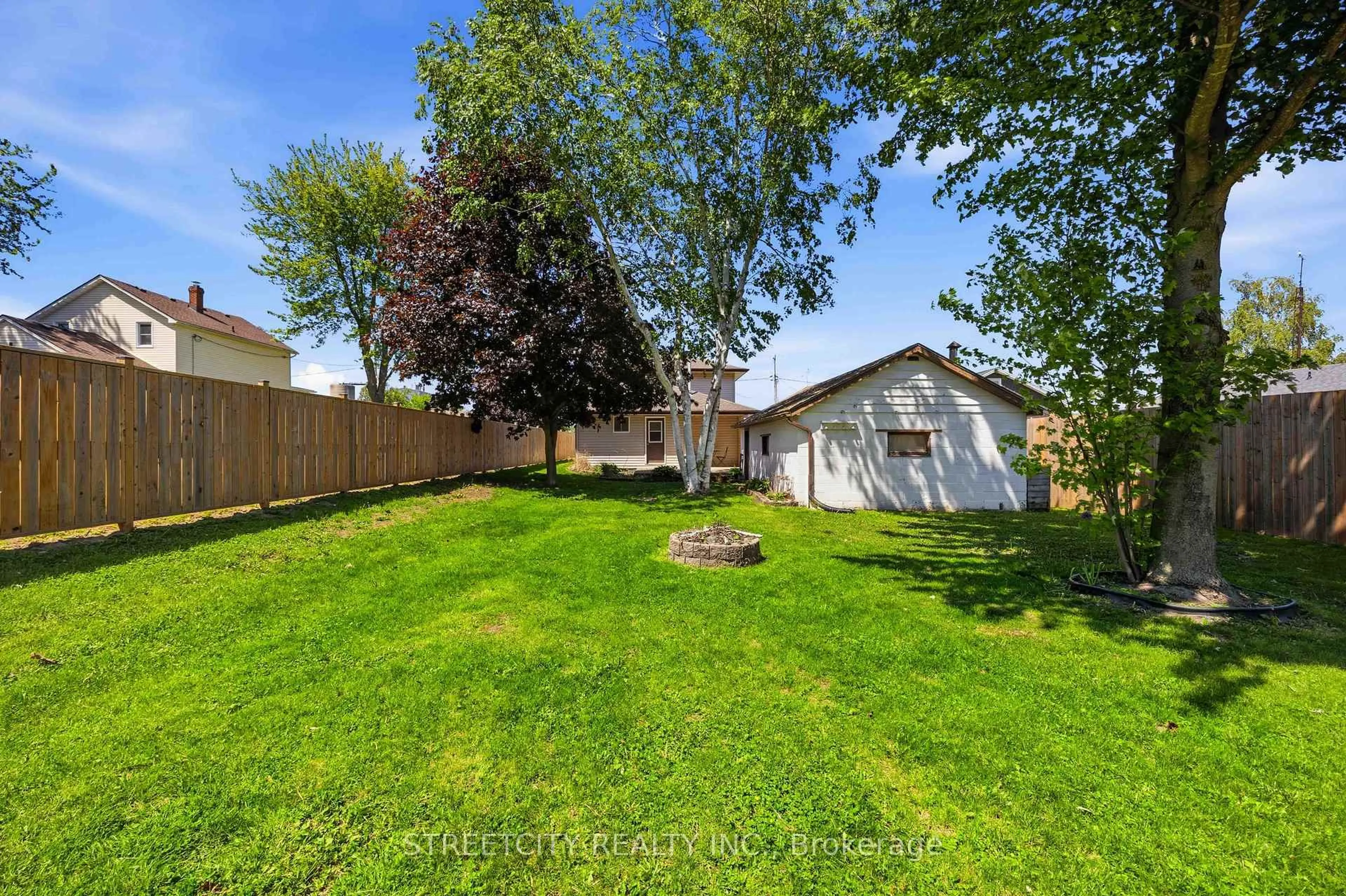 A pic from outside/outdoor area/front of a property/back of a property/a pic from drone, street for 502 Plympton St, Plympton-Wyoming Ontario N0N 1T0