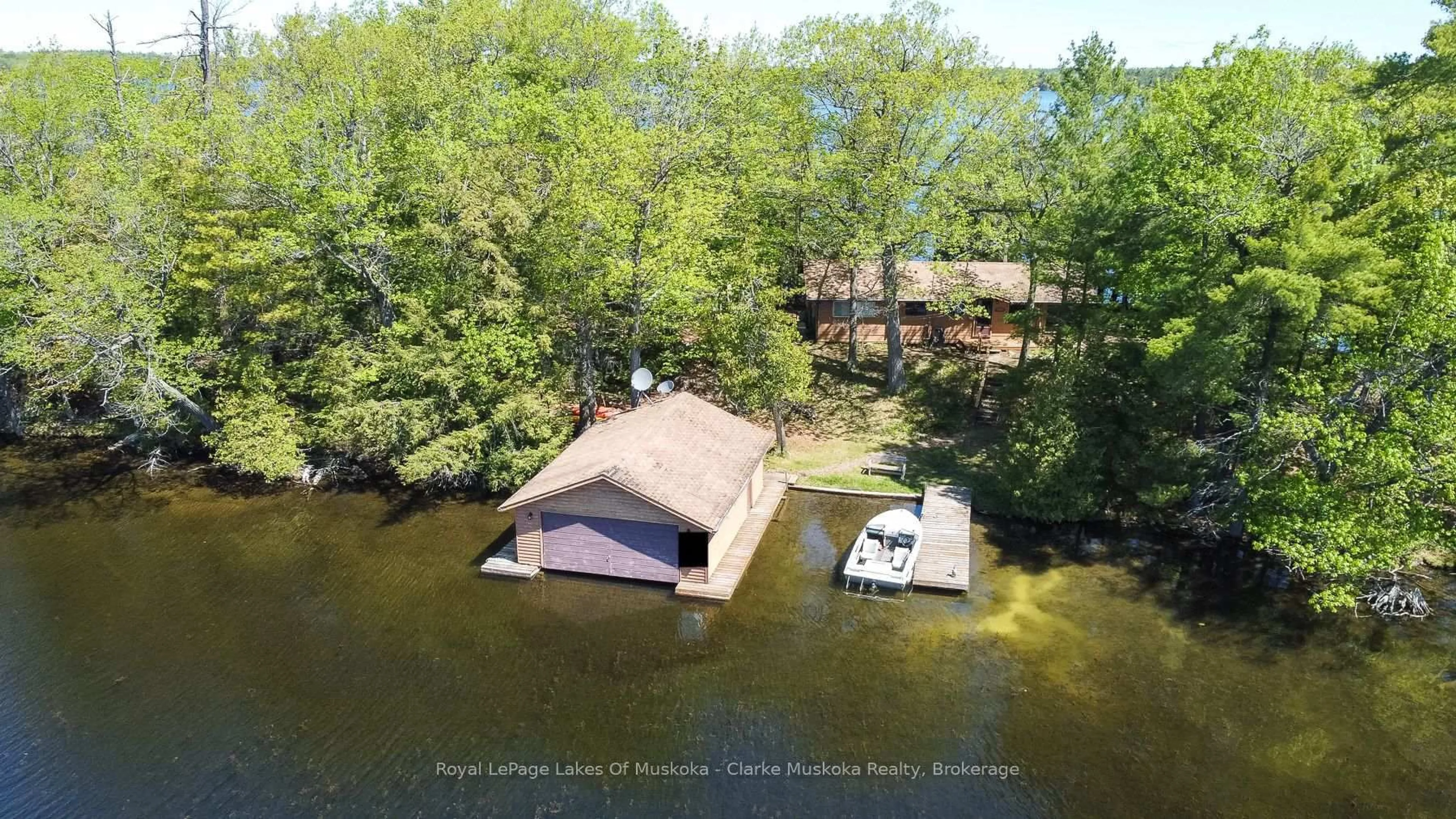 A pic from outside/outdoor area/front of a property/back of a property/a pic from drone, water/lake/river/ocean view for 2 Is 220 Severn River Island, Georgian Bay Ontario L0K 1S0