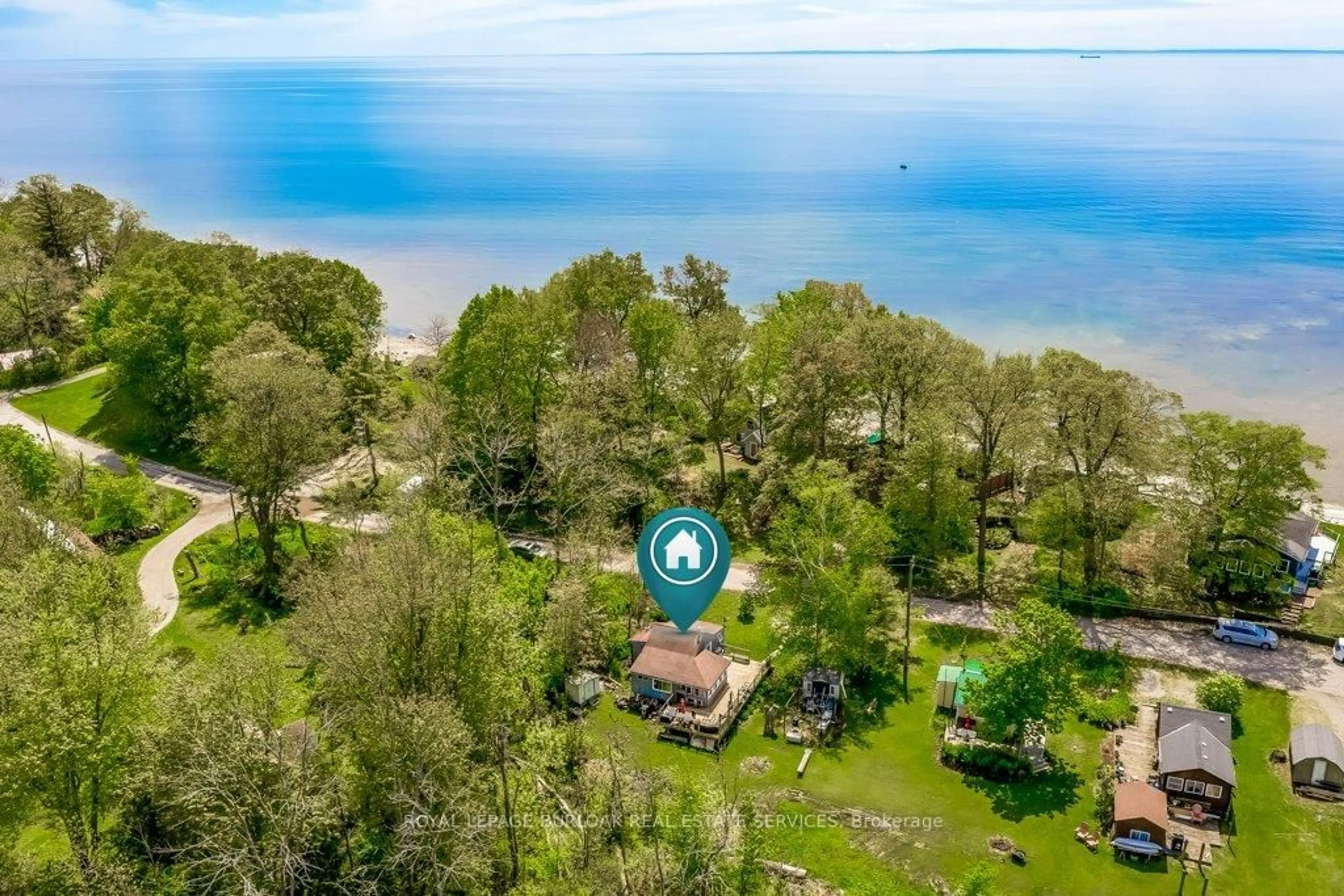 A pic from outside/outdoor area/front of a property/back of a property/a pic from drone, water/lake/river/ocean view for 716 Sandy Bay Rd, Haldimand Ontario N1A 2W6