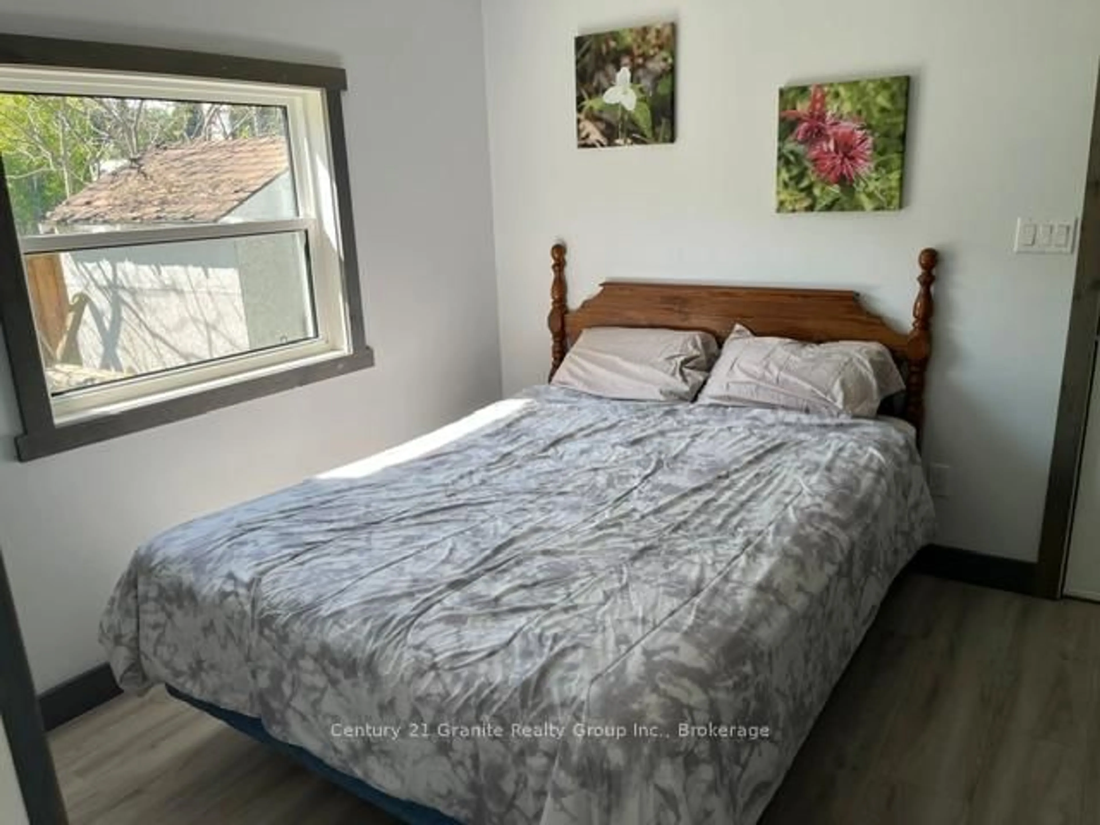 Bedroom with bed, wood/laminate floor for 86 WATER St, Minden Hills Ontario K0M 2K0