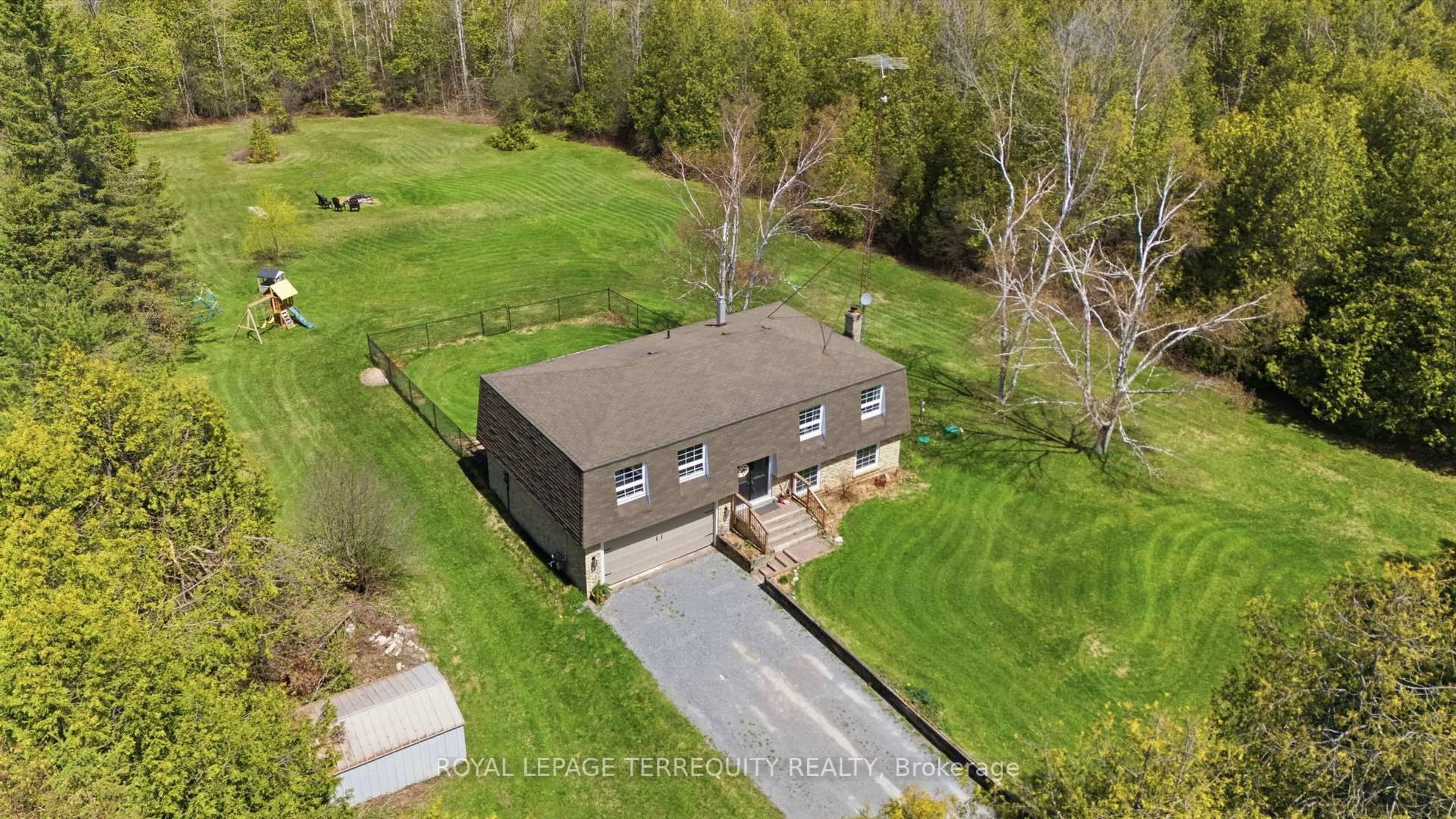 A pic from outside/outdoor area/front of a property/back of a property/a pic from drone, unknown for 119 Farmstead Rd, Kawartha Lakes Ontario K0M 2J0