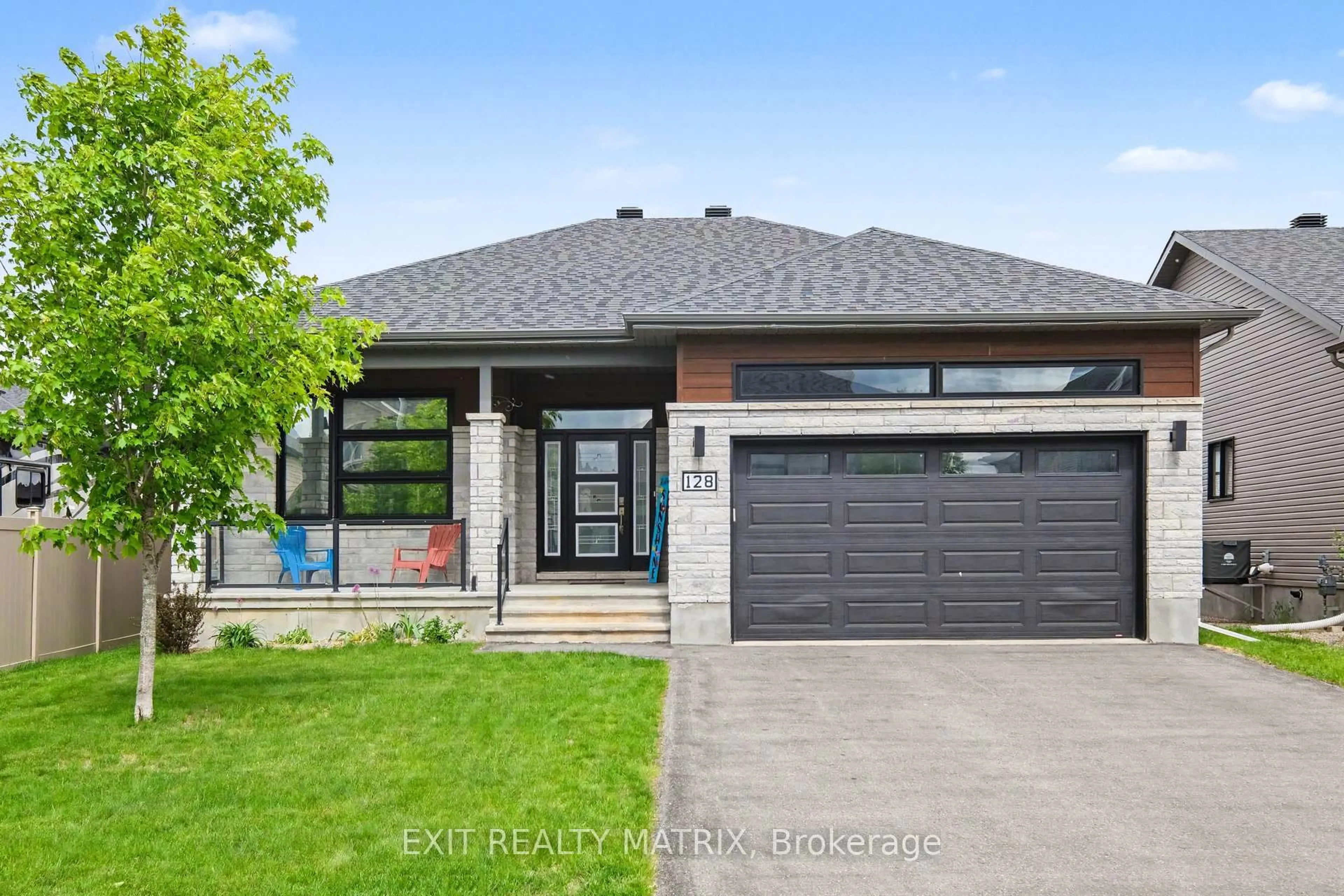 Home with brick exterior material, street for 128 Lyon St, Russell Ontario K0A 1W0