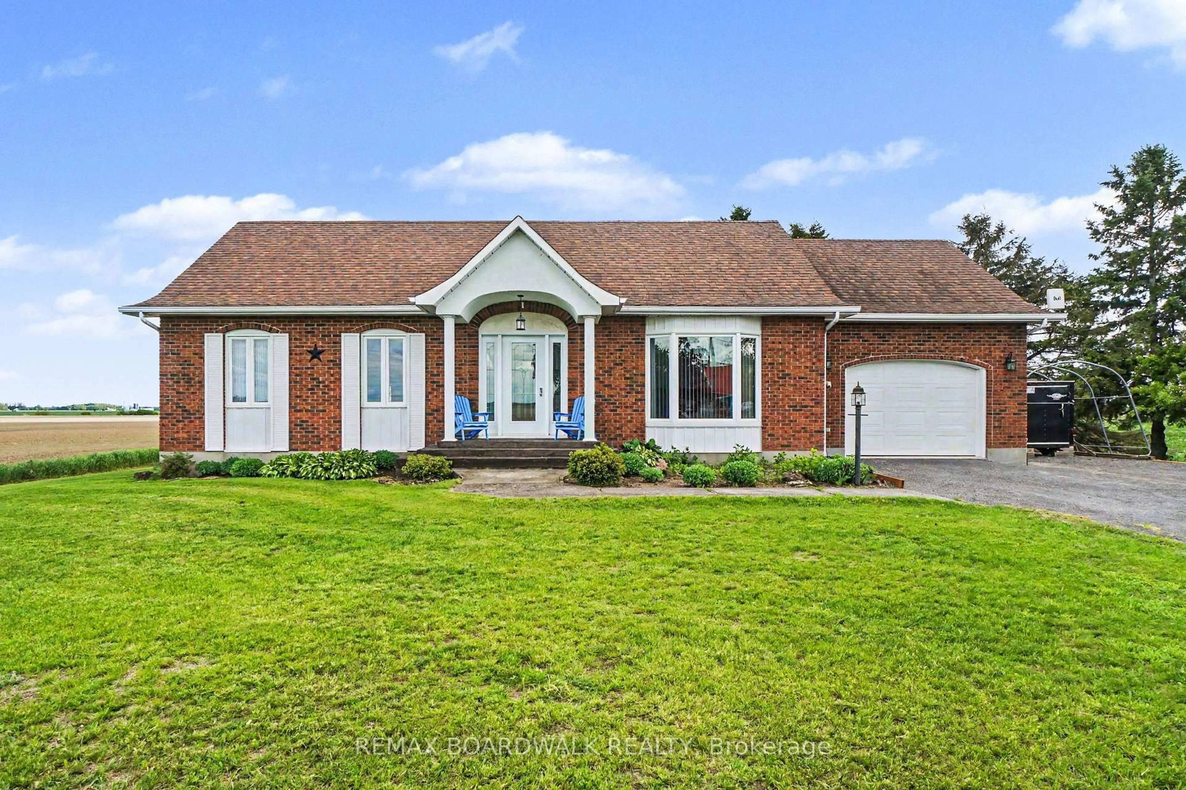 Home with brick exterior material, street for 1525 Route 900, The Nation Ontario K0A 3C0