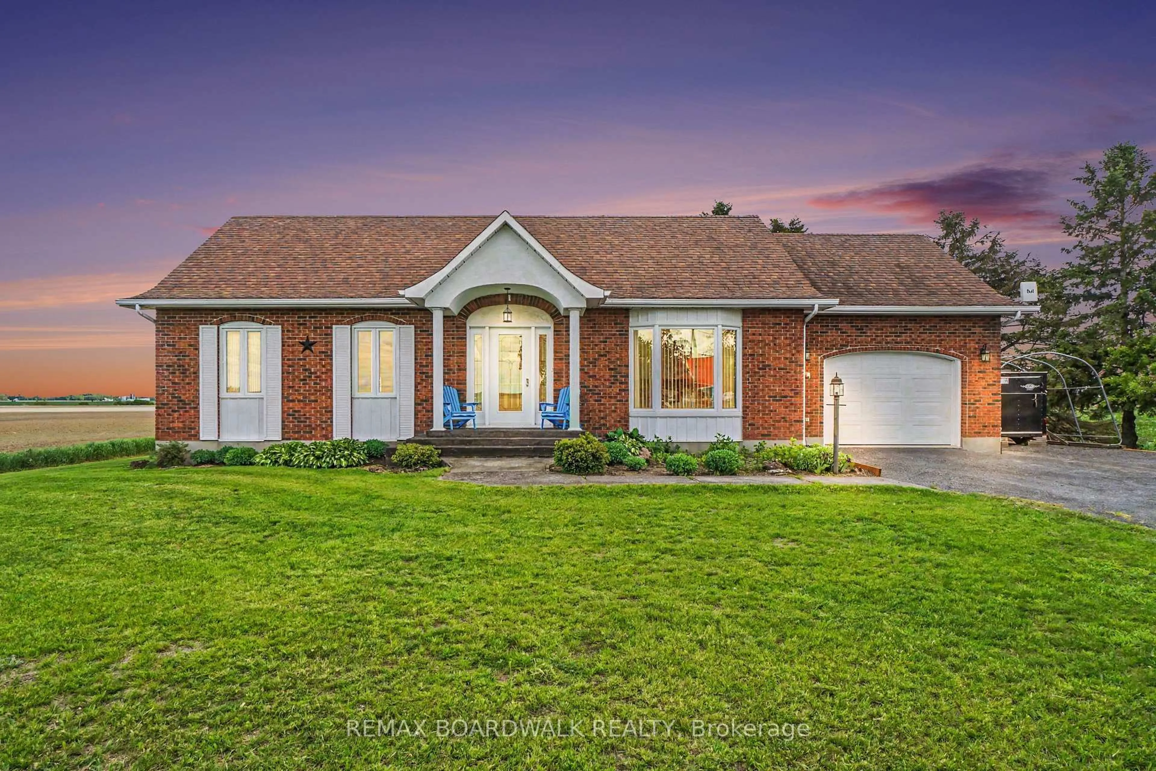 Home with brick exterior material, street for 1525 Route 900, The Nation Ontario K0A 3C0