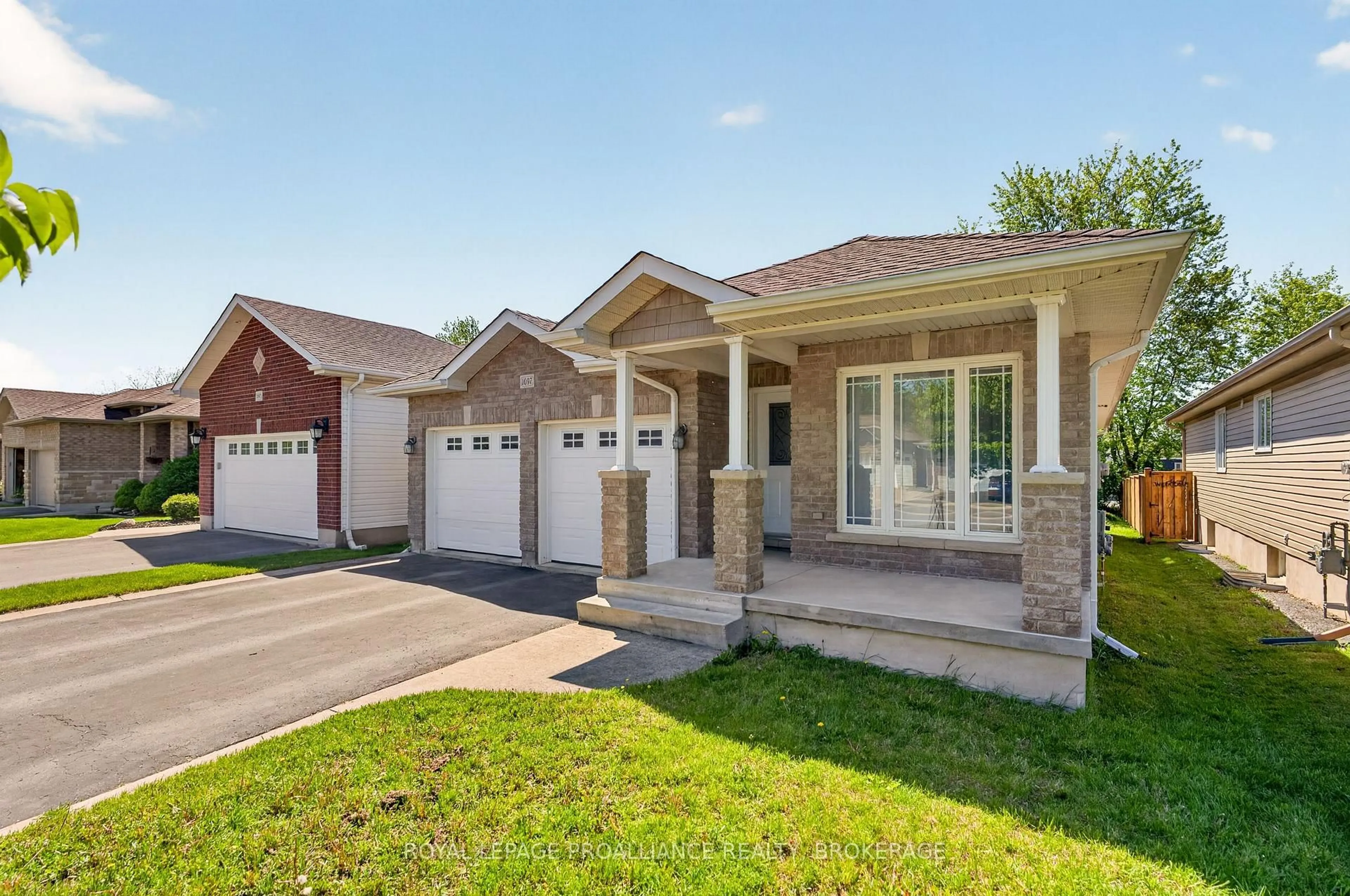 Home with brick exterior material, street for 1097 Crossfield Ave, Kingston Ontario K7P 0G7