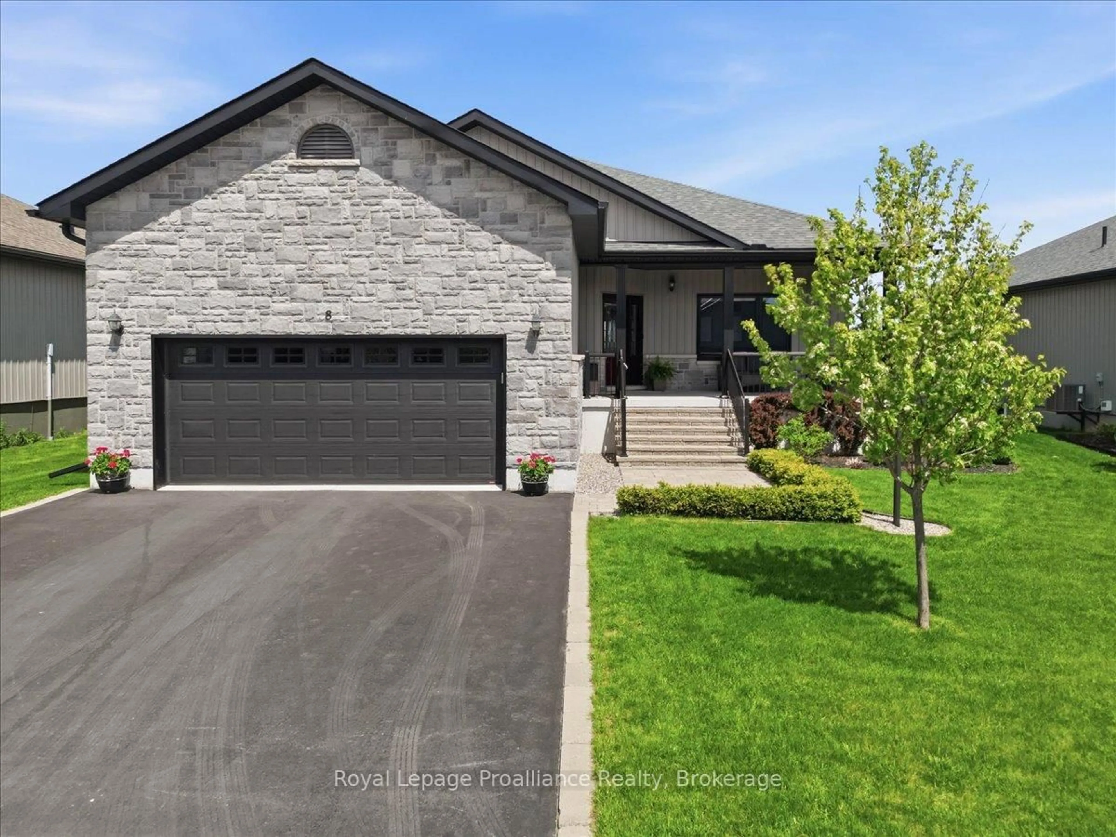 Home with brick exterior material, street for 8 Dorchester Dr, Prince Edward County Ontario K0K 3L0