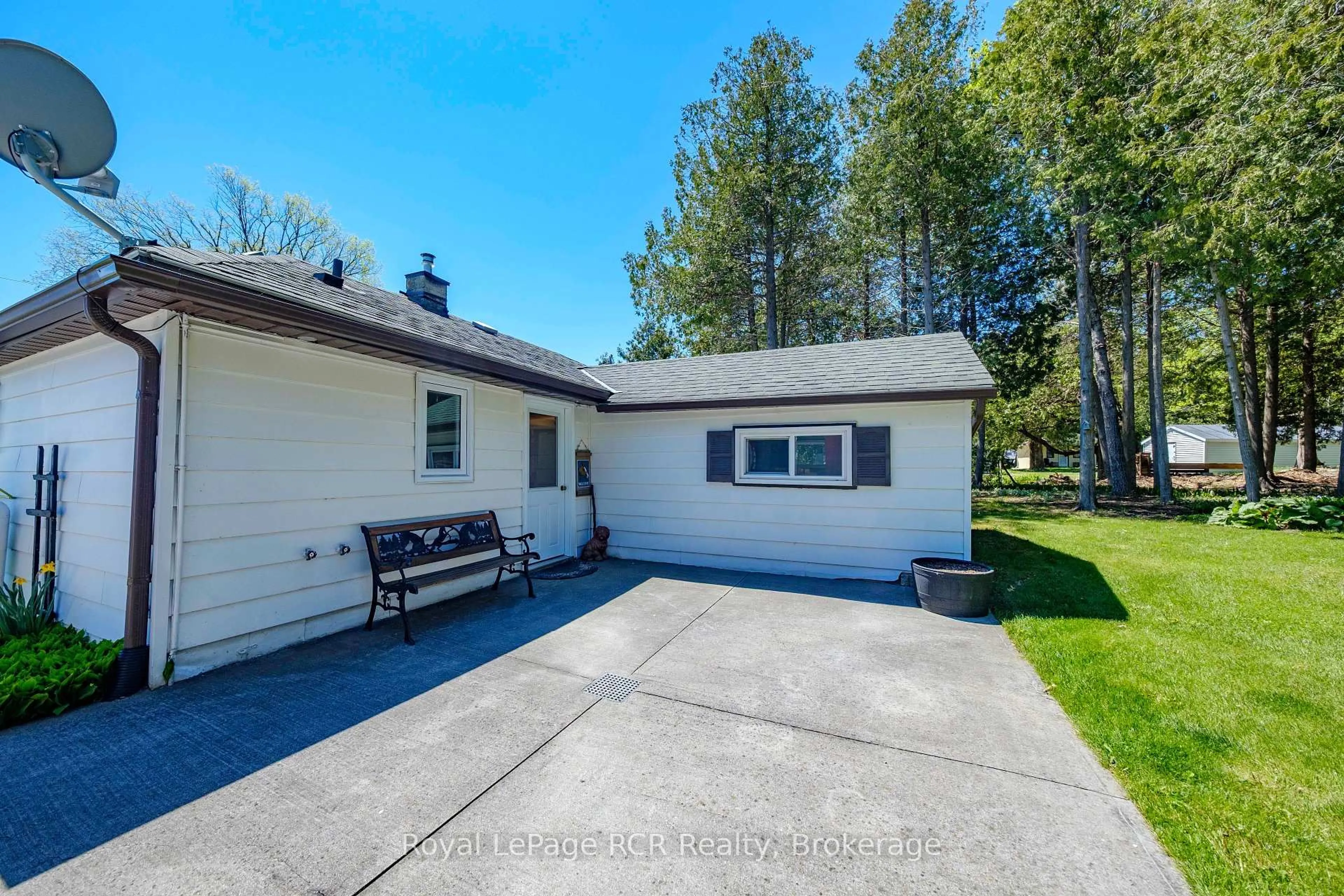 A pic from outside/outdoor area/front of a property/back of a property/a pic from drone, street for 94 Tamarac Rd, Northern Bruce Peninsula Ontario N0H 2M0