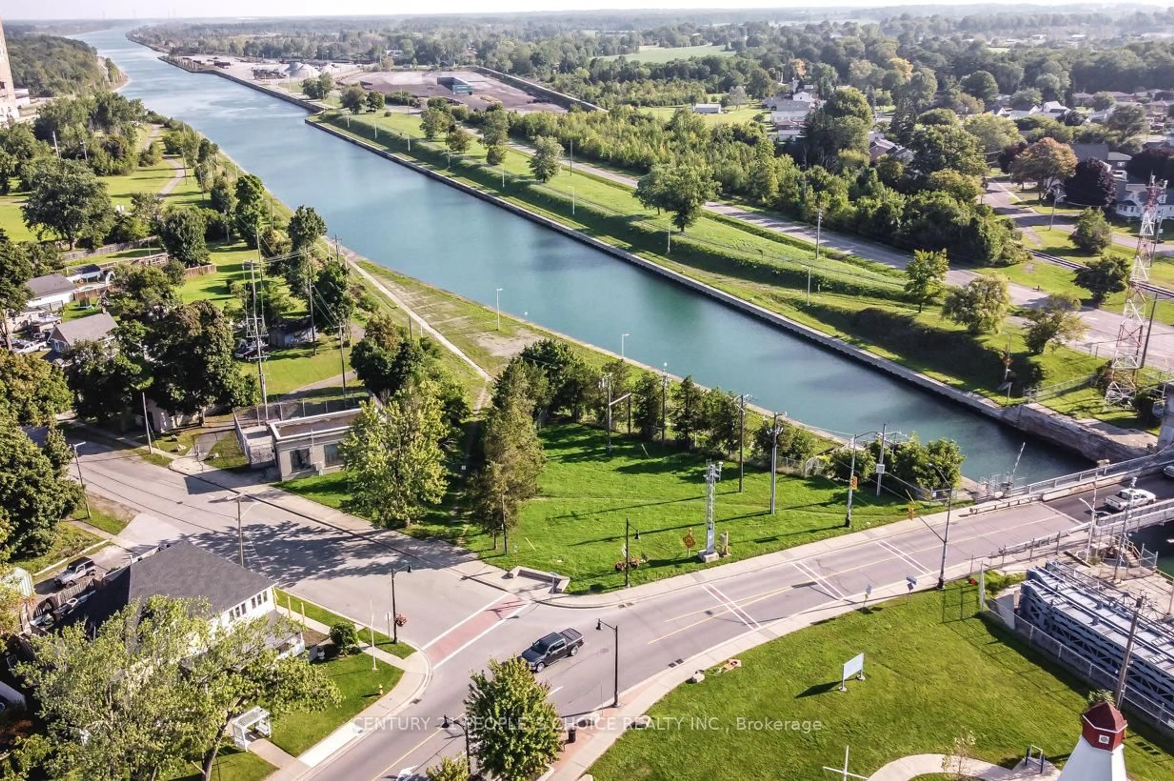 A pic from outside/outdoor area/front of a property/back of a property/a pic from drone, water/lake/river/ocean view for 72 Main St #107, Port Colborne Ontario L3K 5Z8