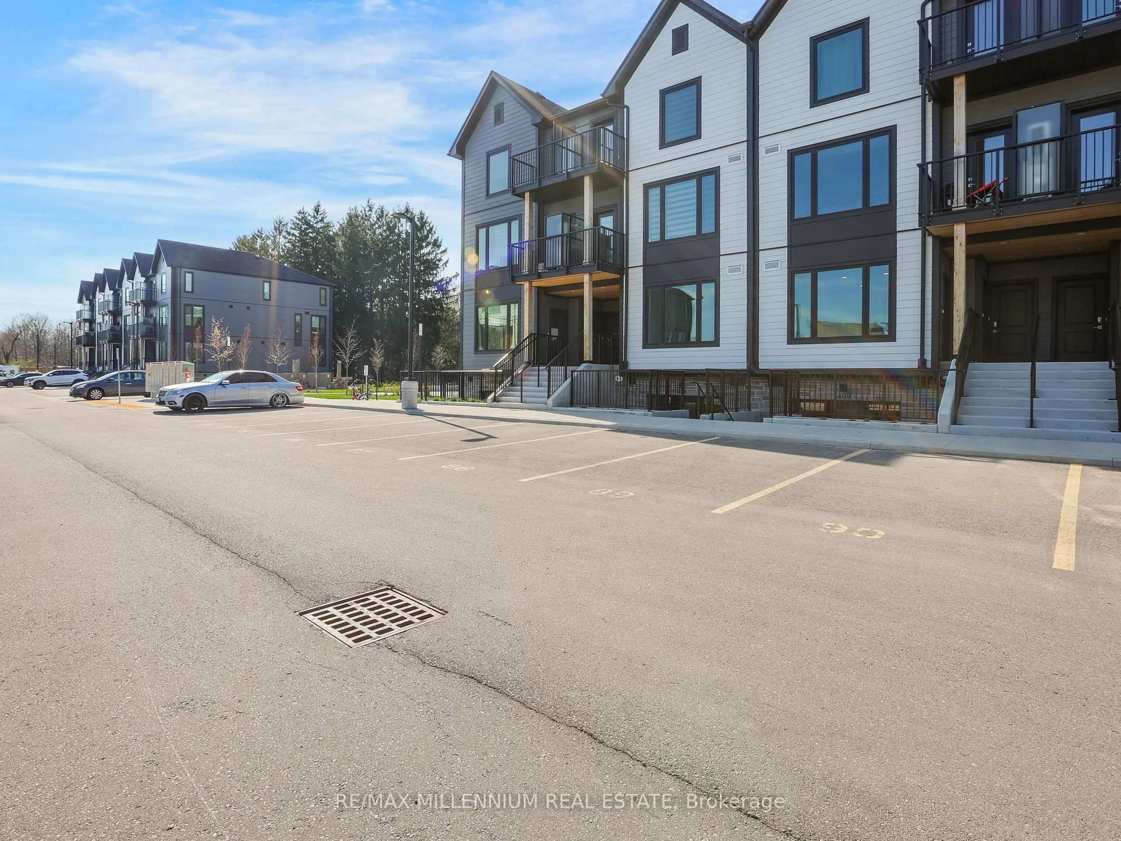 A pic from outside/outdoor area/front of a property/back of a property/a pic from drone, street for 708 Woolwich St #206, Guelph Ontario N1H 0C8