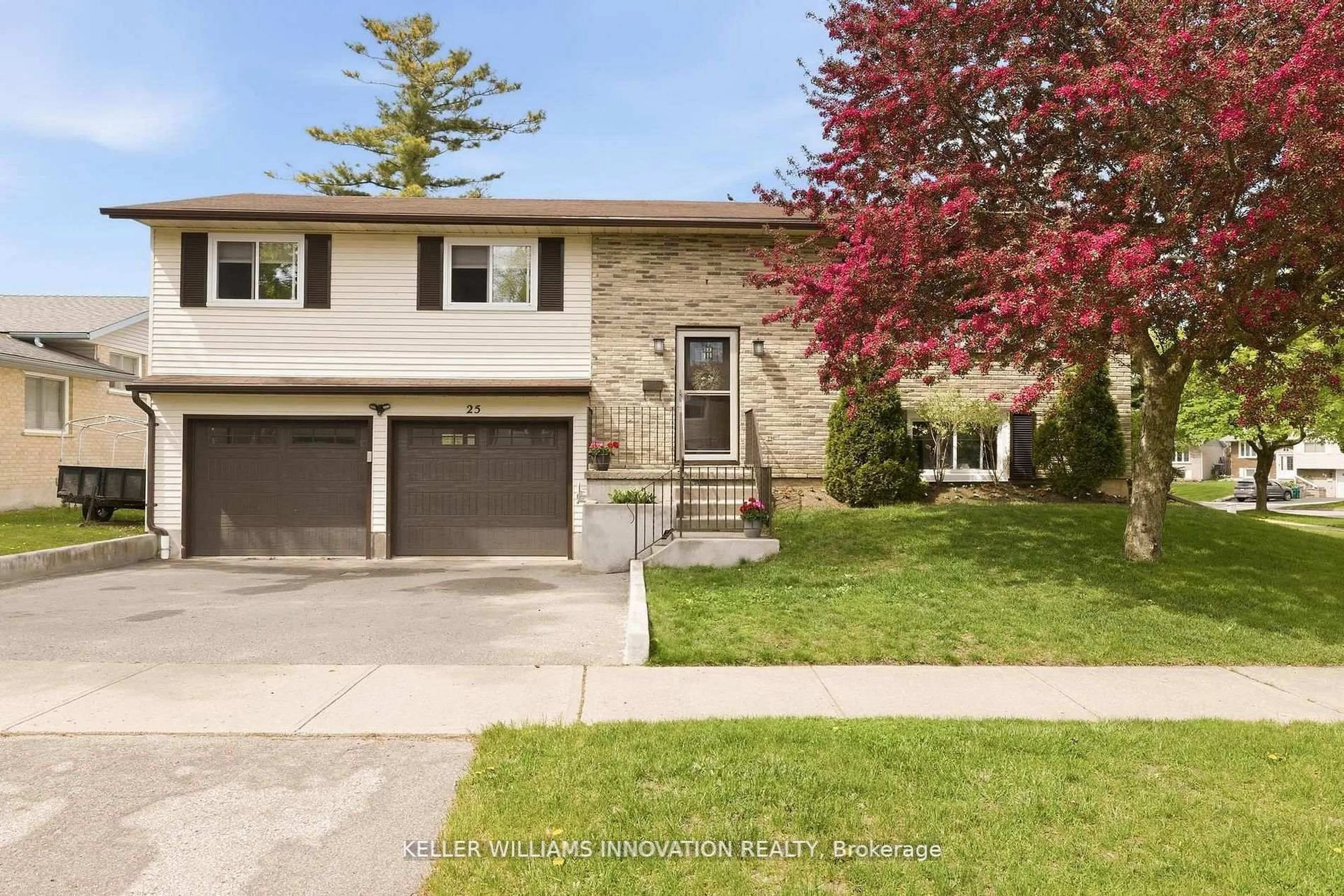 Home with vinyl exterior material, street for 25 Greenock Dr, Kitchener Ontario N2E 2J9