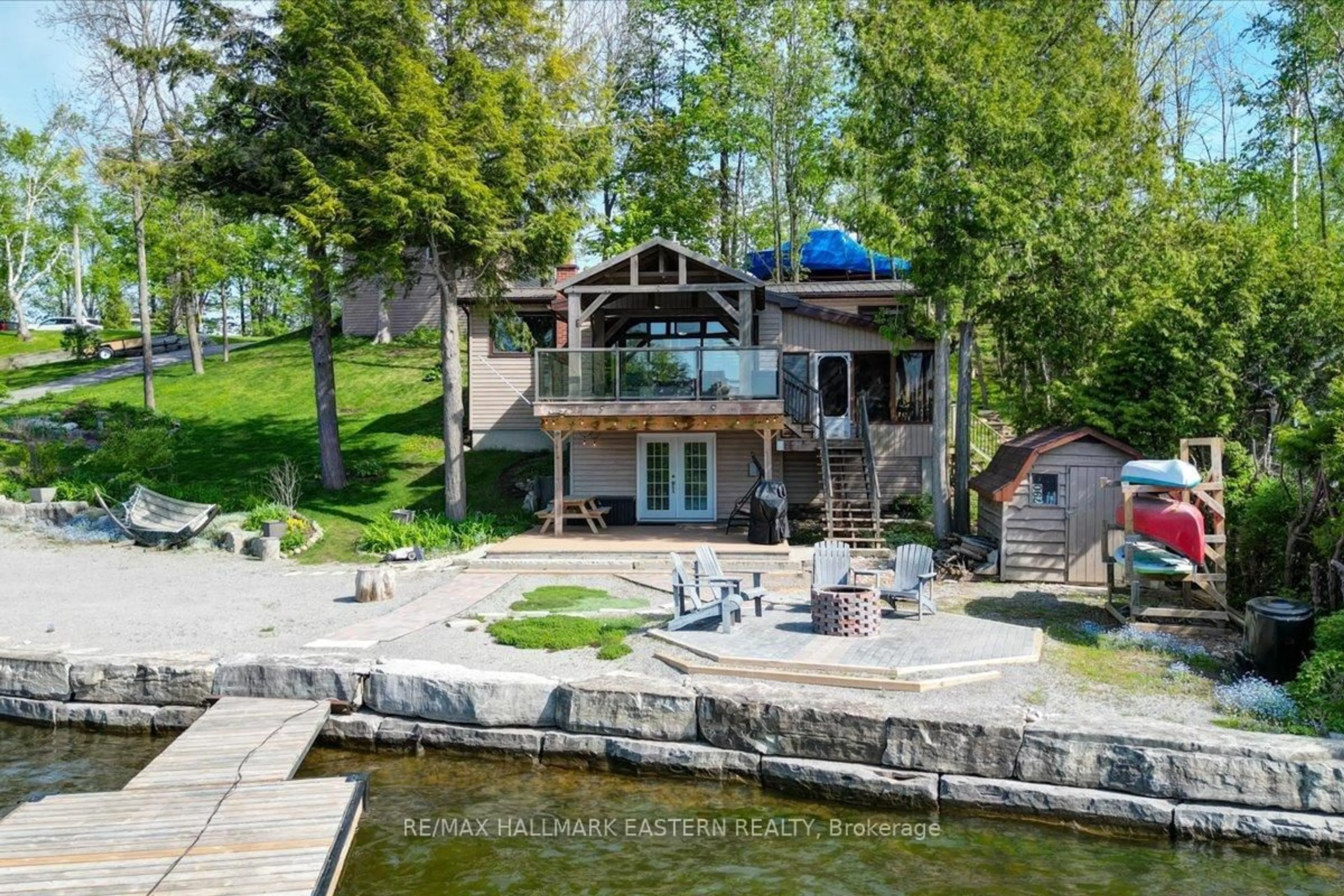 A pic from outside/outdoor area/front of a property/back of a property/a pic from drone, water/lake/river/ocean view for 790 Fife's Bay Marina Lane, Selwyn Ontario K9J 6X3
