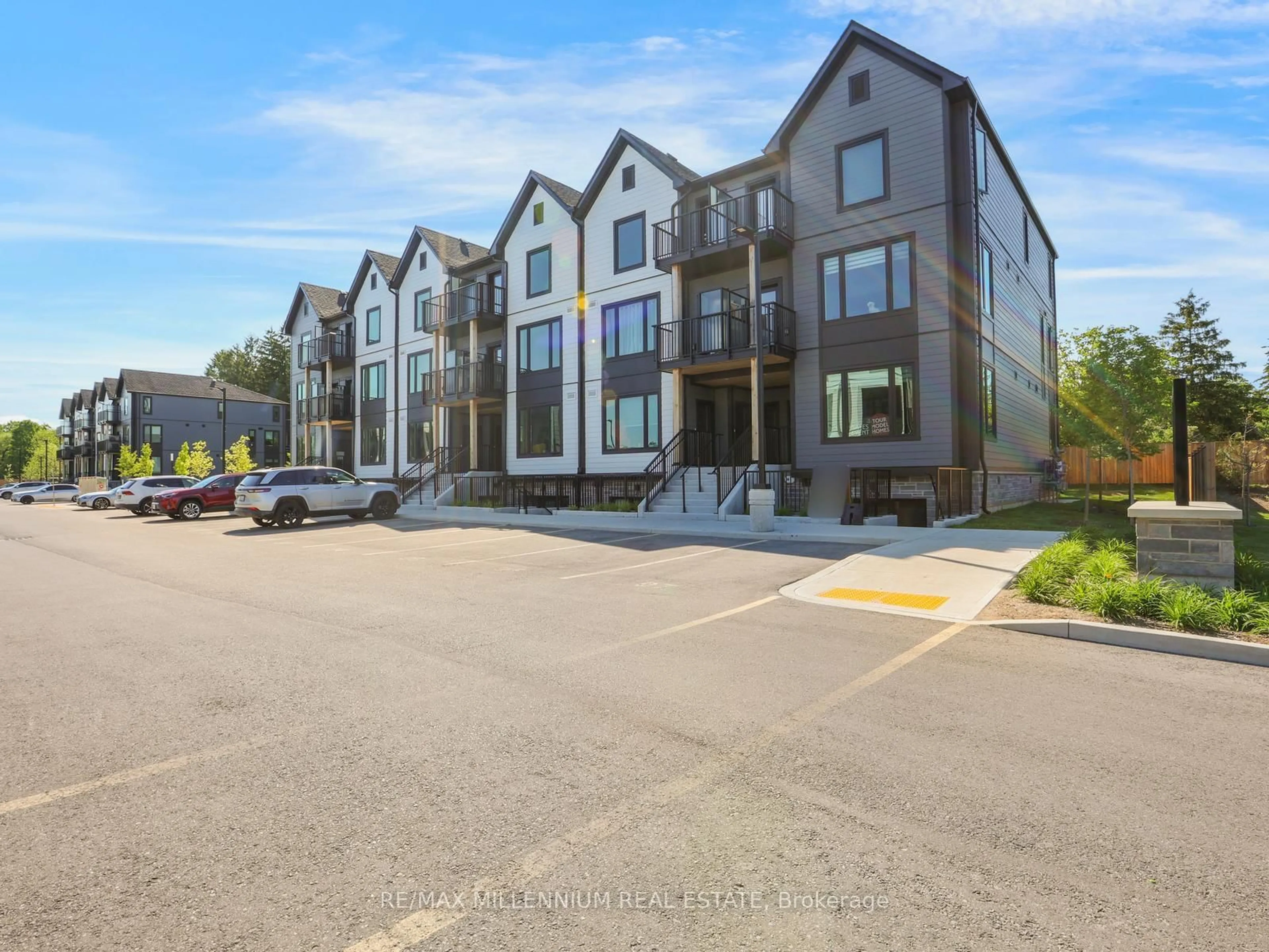 A pic from outside/outdoor area/front of a property/back of a property/a pic from drone, street for 708 Woolwich St #423, Guelph Ontario N1H 0C8