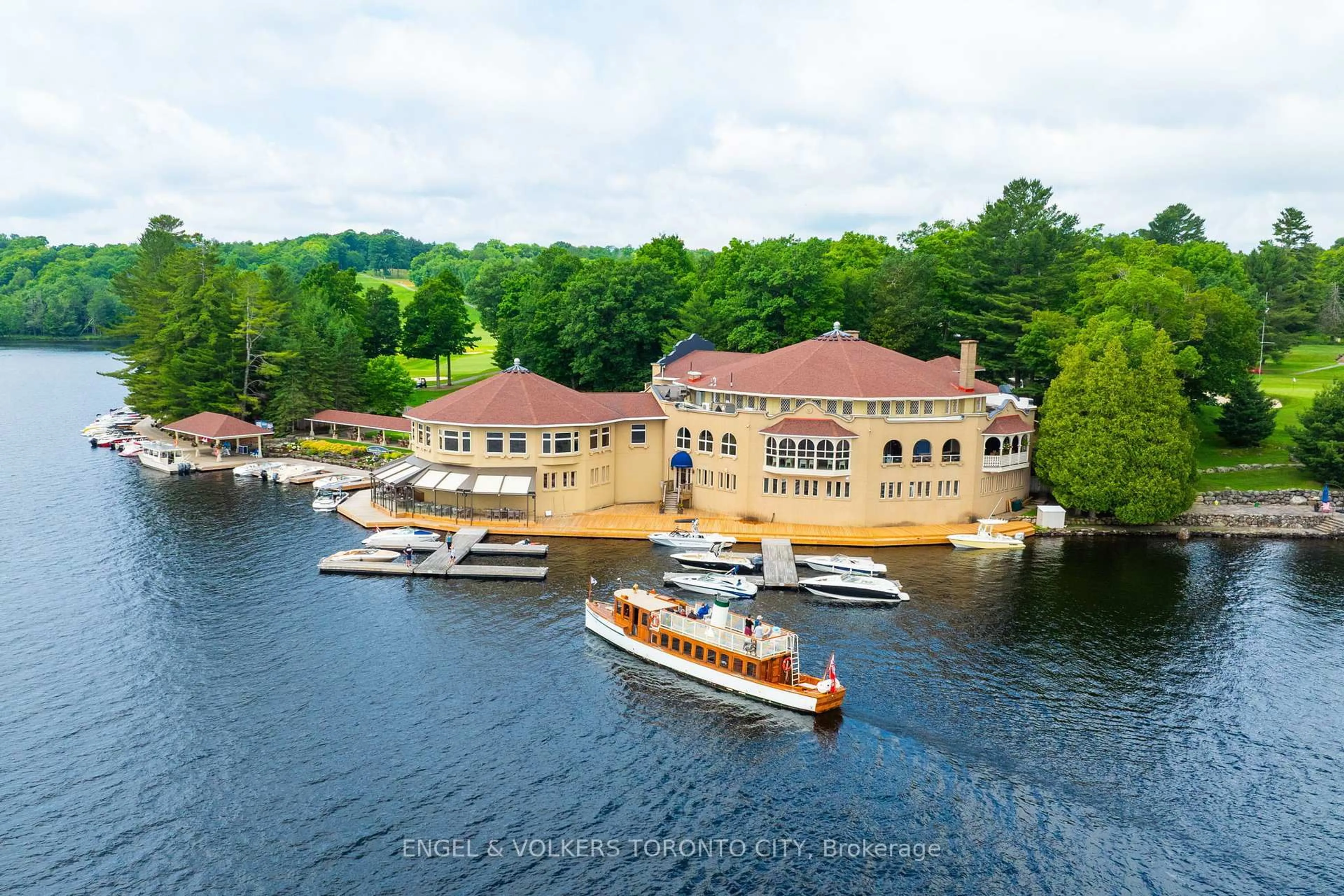 A pic from outside/outdoor area/front of a property/back of a property/a pic from drone, water/lake/river/ocean view for 12 Bigwin Island #129, Lake of Bays Ontario P0B 1A0