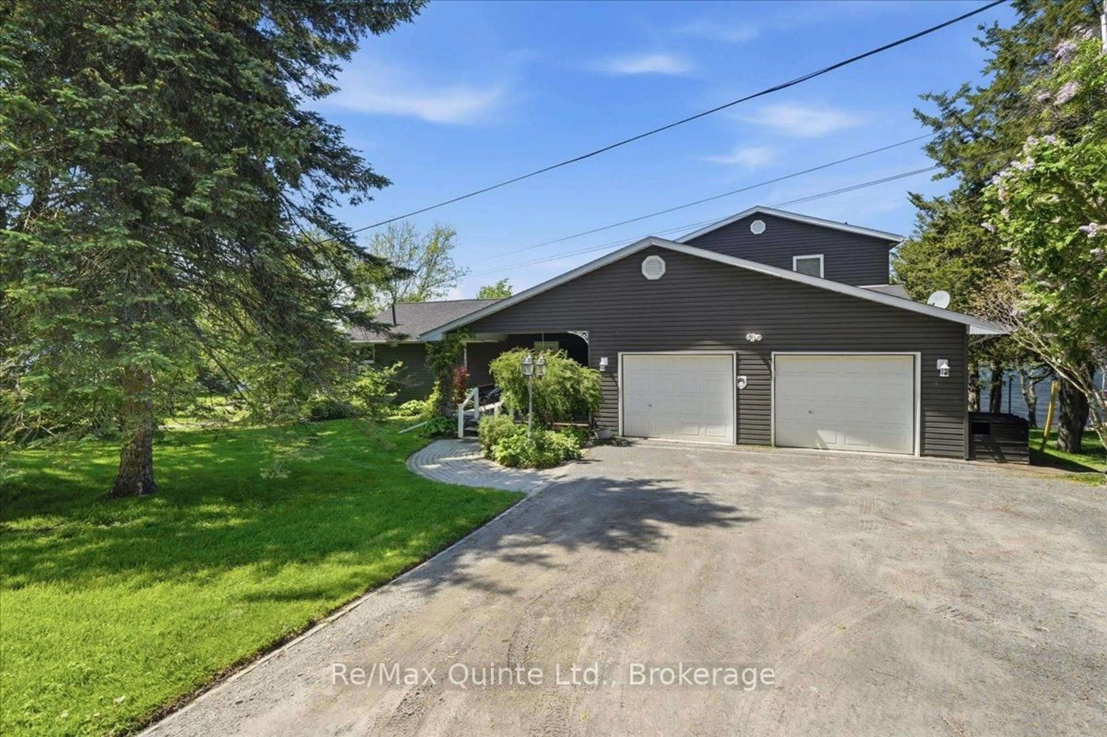 A pic from outside/outdoor area/front of a property/back of a property/a pic from drone, street for 92 Bishop Lane, Prince Edward County Ontario K0K 1A0