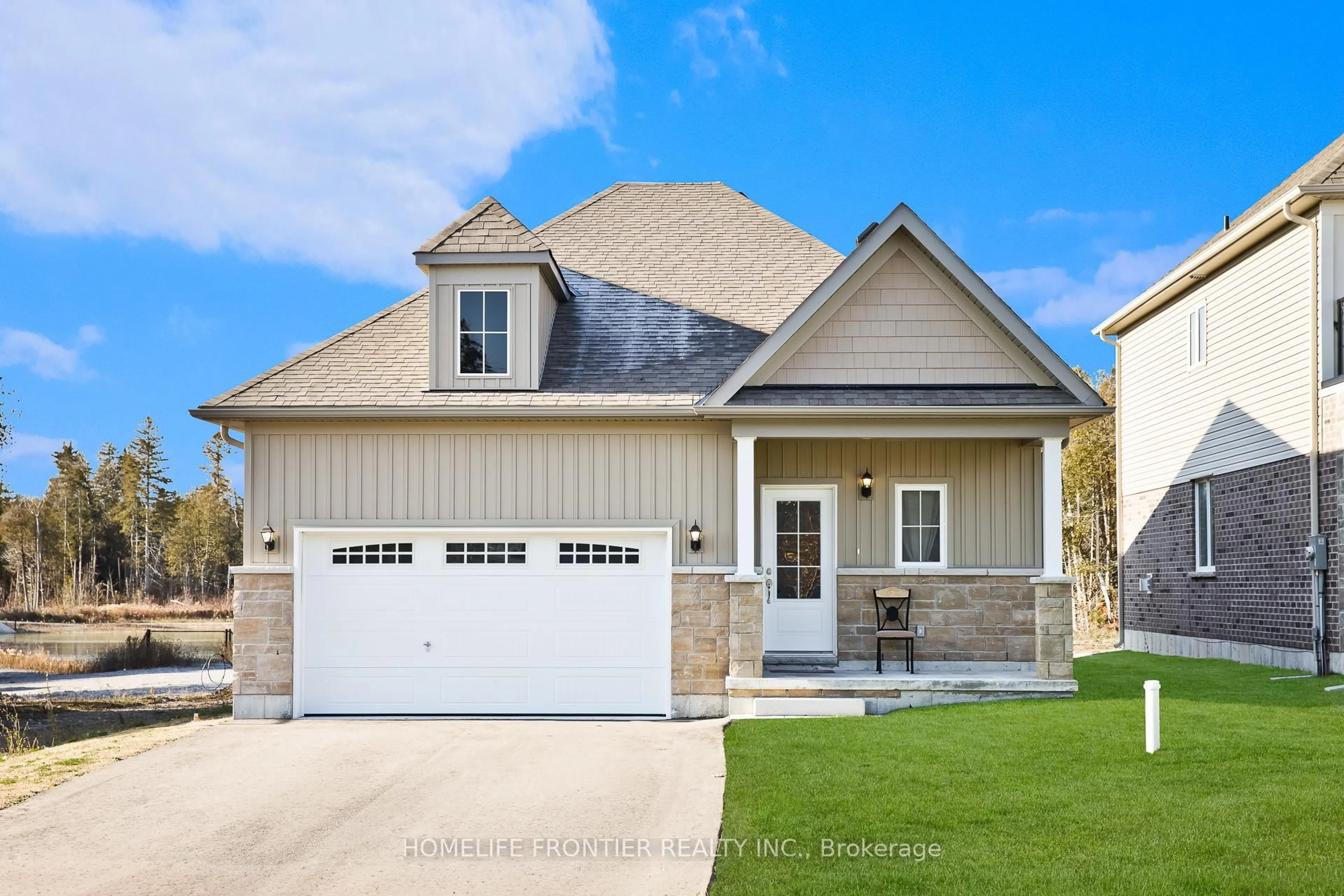 Home with brick exterior material, street for 11 Spruceside Dr, Kawartha Lakes Ontario K0M 1A0