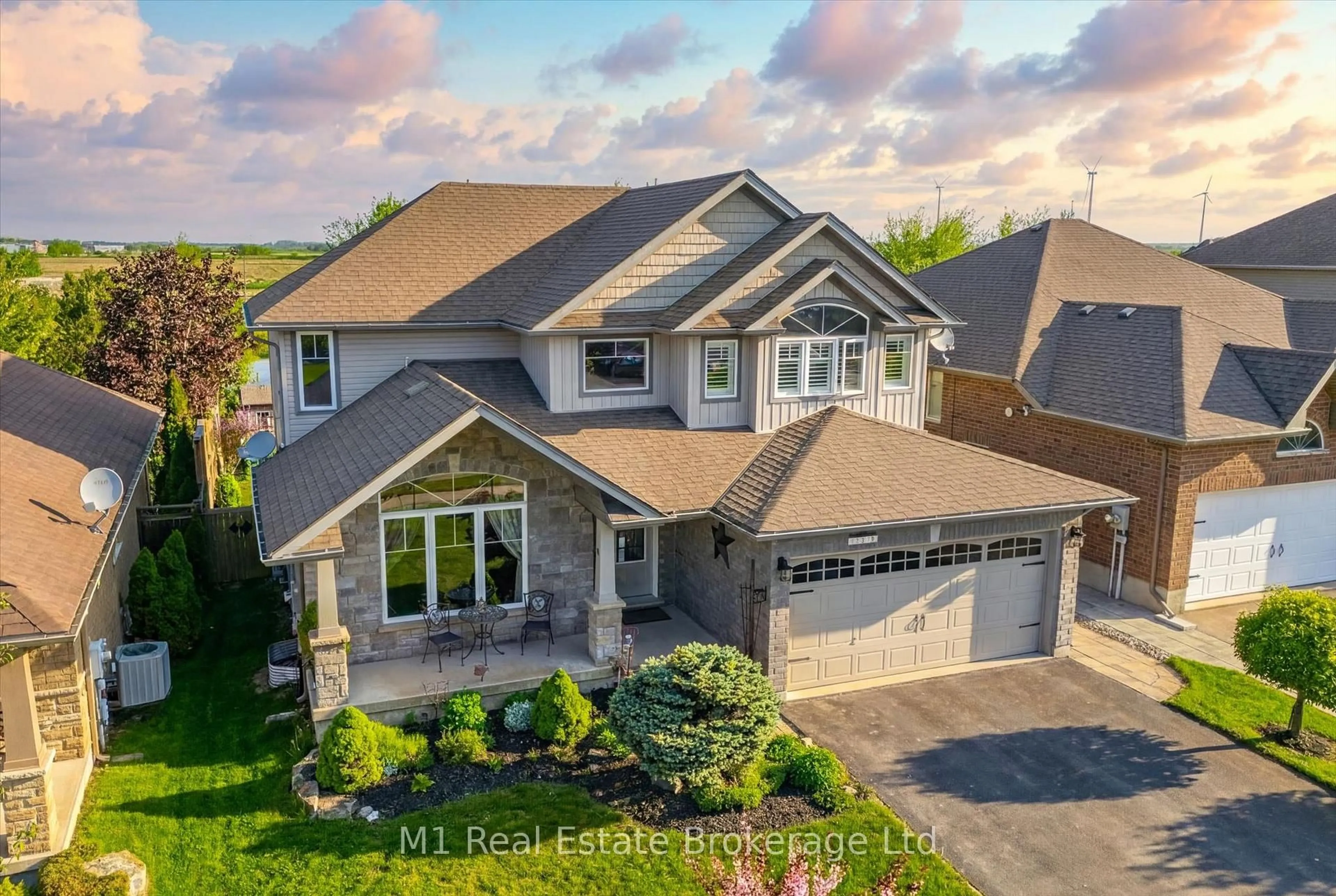 A pic from outside/outdoor area/front of a property/back of a property/a pic from drone, street for 237 Carrol St, Wellington North Ontario N0G 1A0